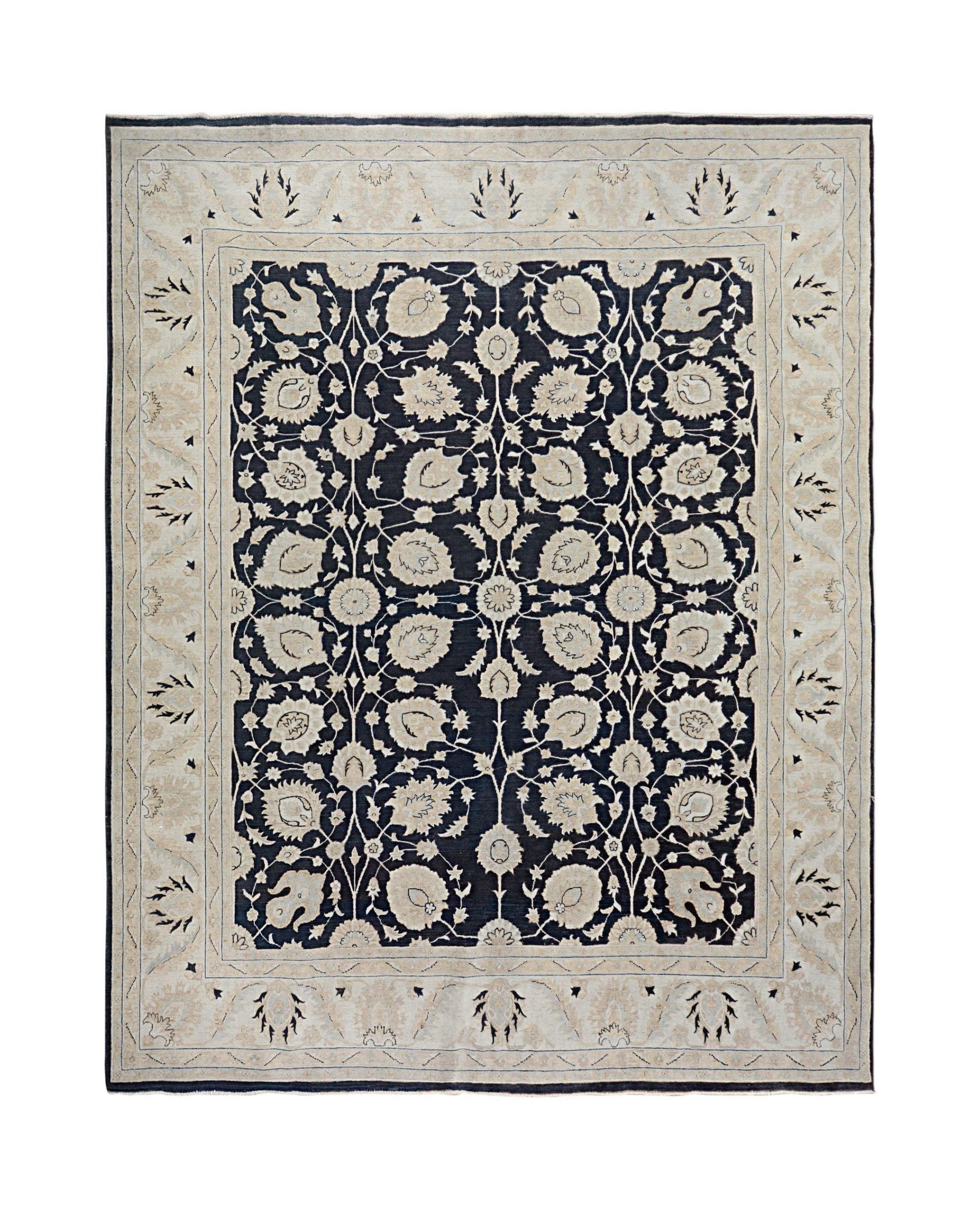 An Afghan Chobi rug featuring a dark blue field with intricate floral patterns and a beige border.