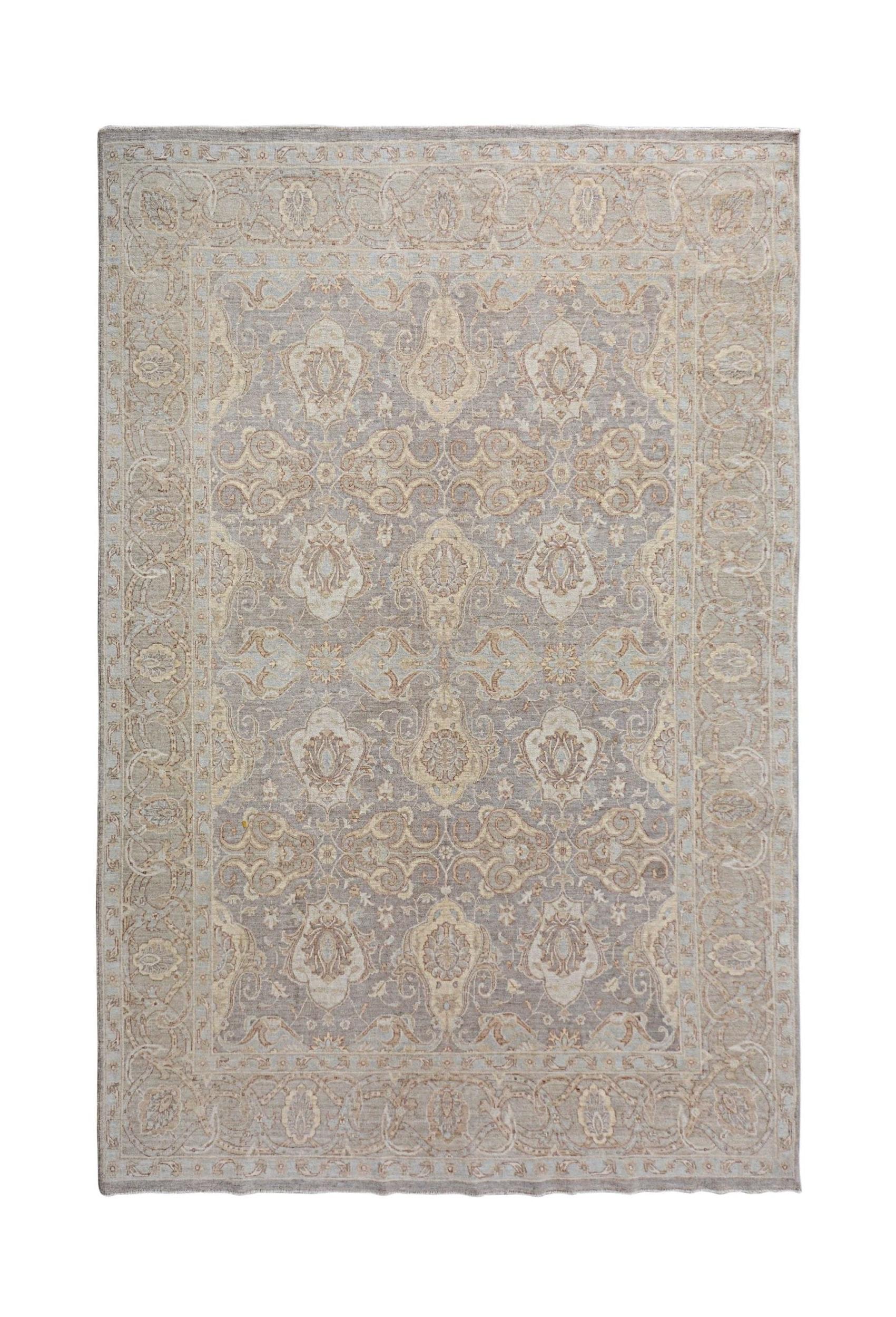 An Afghan Chobi rug featuring a traditional floral pattern in muted beige and grey tones.