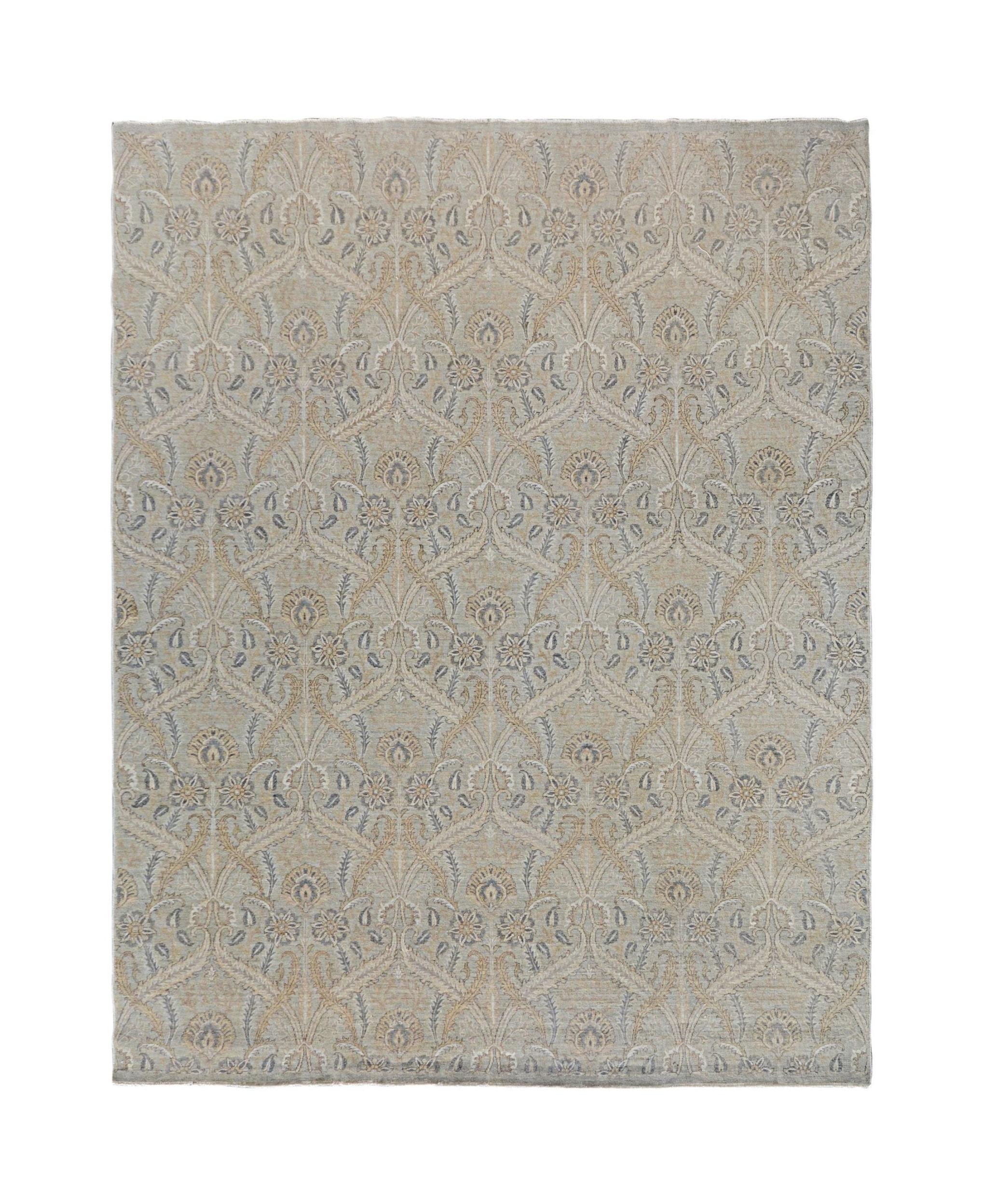 A handmade Afghan Chobi rug featuring a traditional floral pattern in soft beige and blue tones.