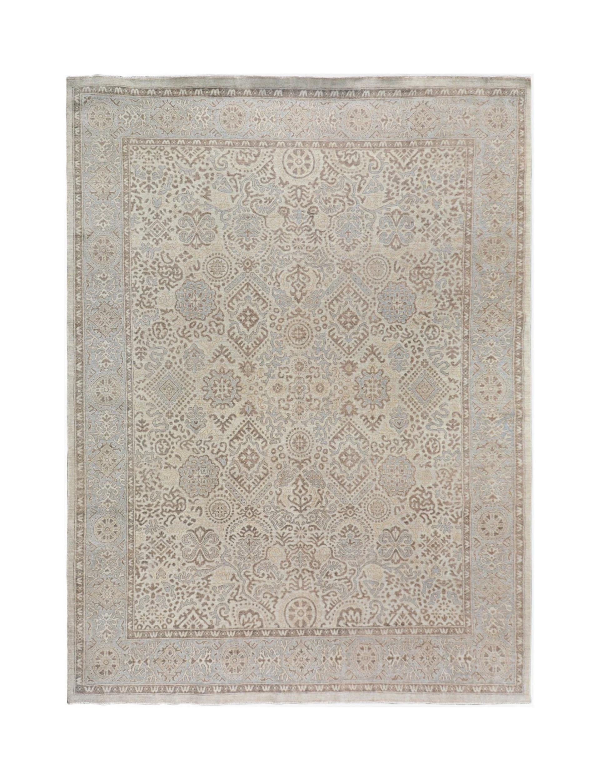 A handmade Afghan Chobi rug featuring a traditional intricate pattern in soft beige and blue tones.