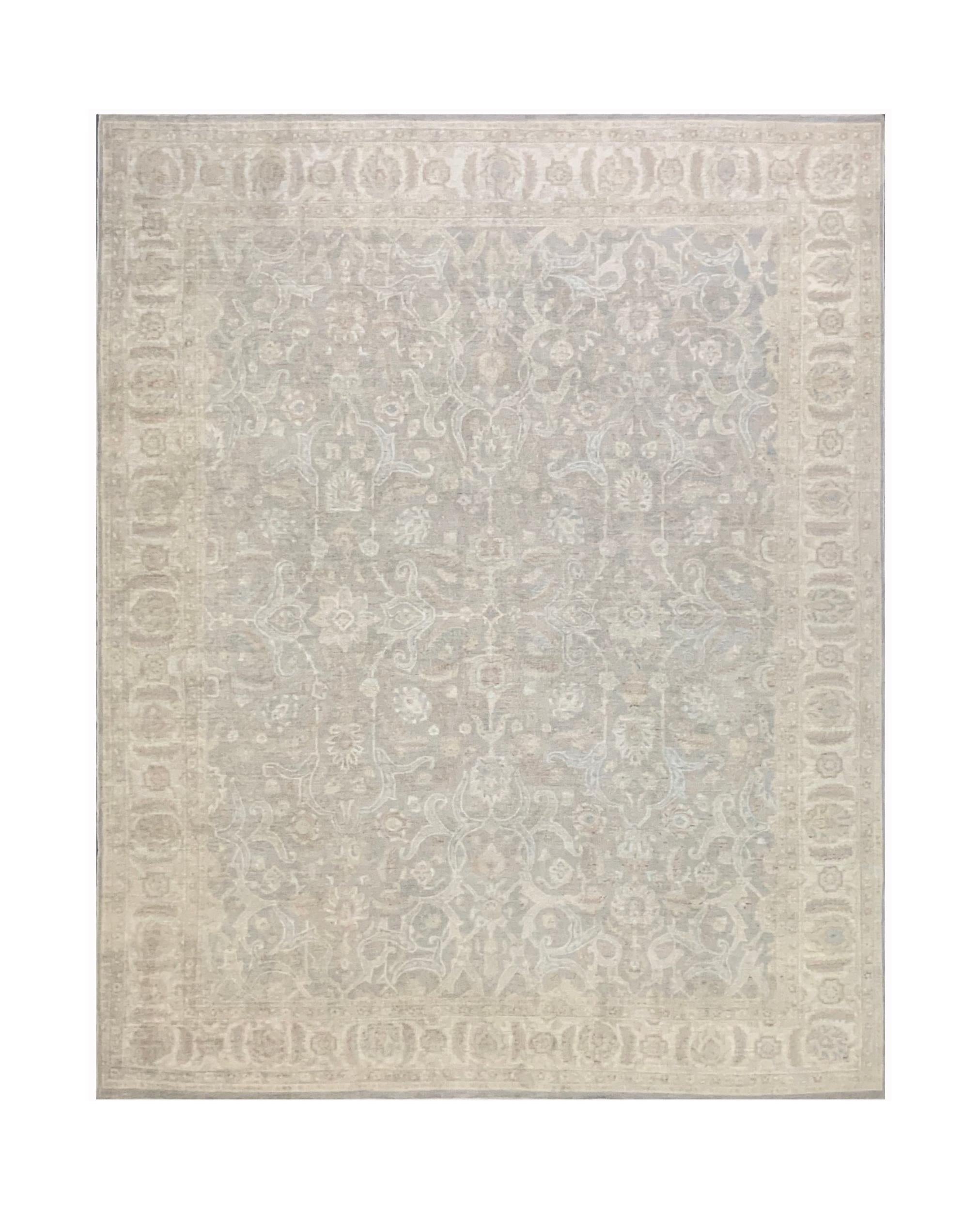A handmade Afghan Chobi rug featuring a traditional floral pattern in soft, neutral wood tones.