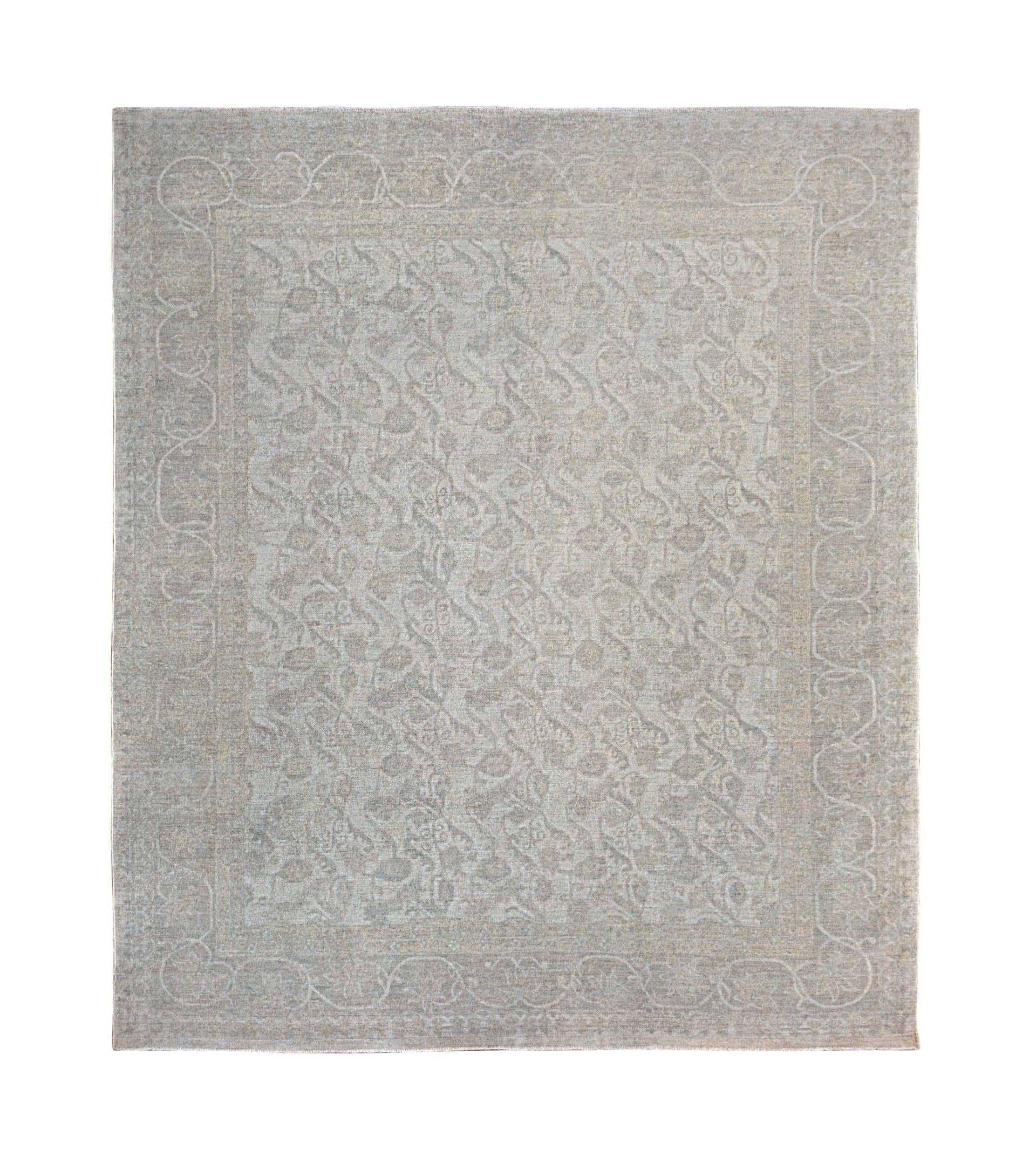 A rectangular Afghan Chobi rug featuring a traditional floral pattern in soft, neutral wood tones.
