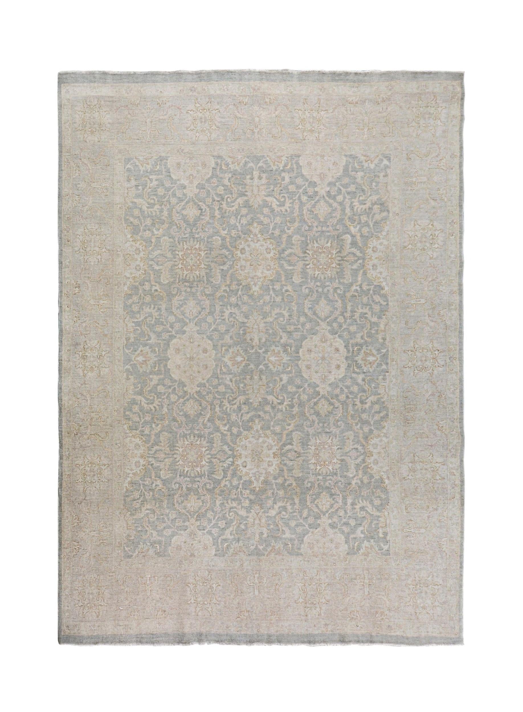A handmade Afghan Chobi rug featuring a traditional floral pattern in soft blue and beige tones.