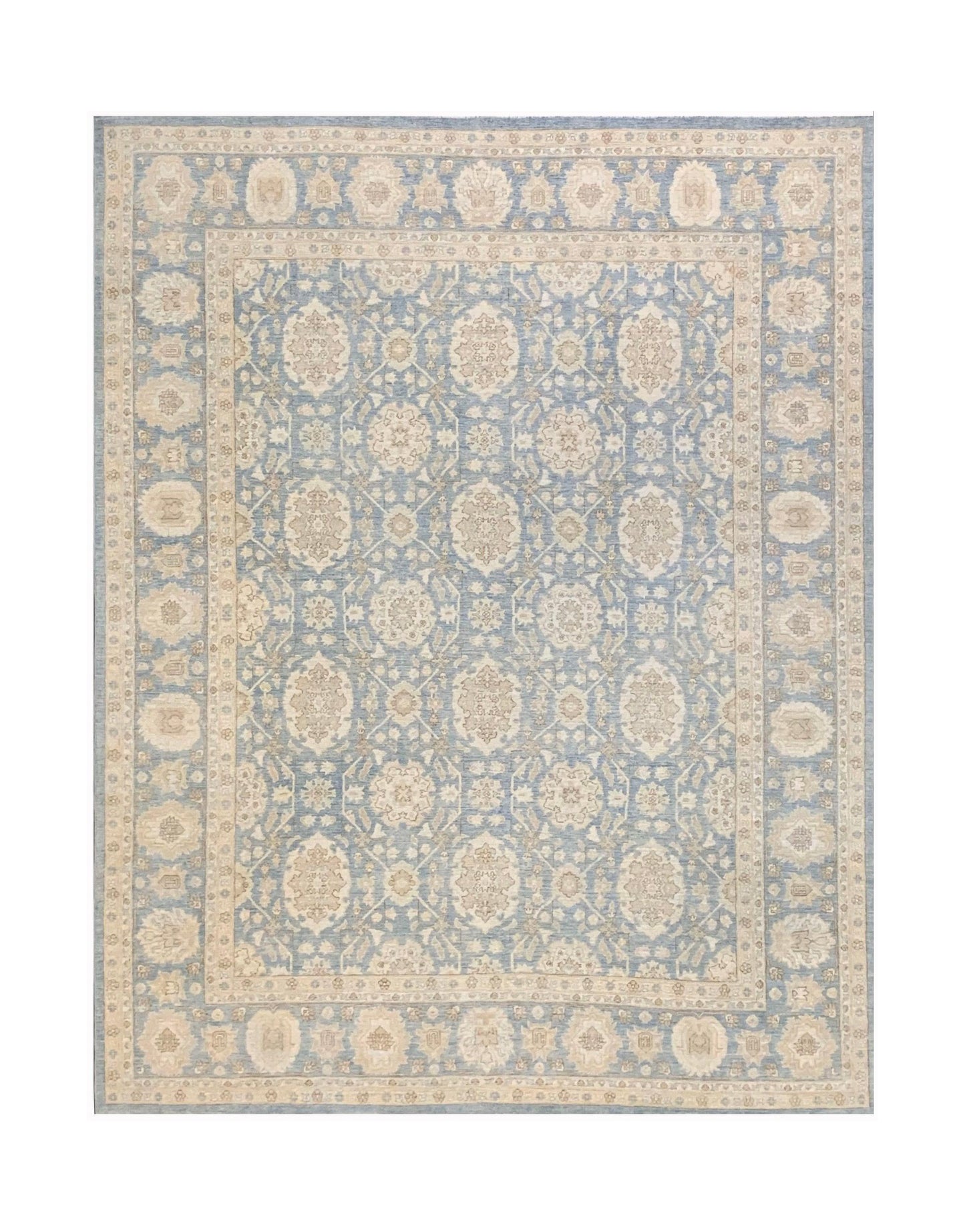 A handmade Afghan Chobi rug featuring a traditional floral pattern in shades of blue and beige.