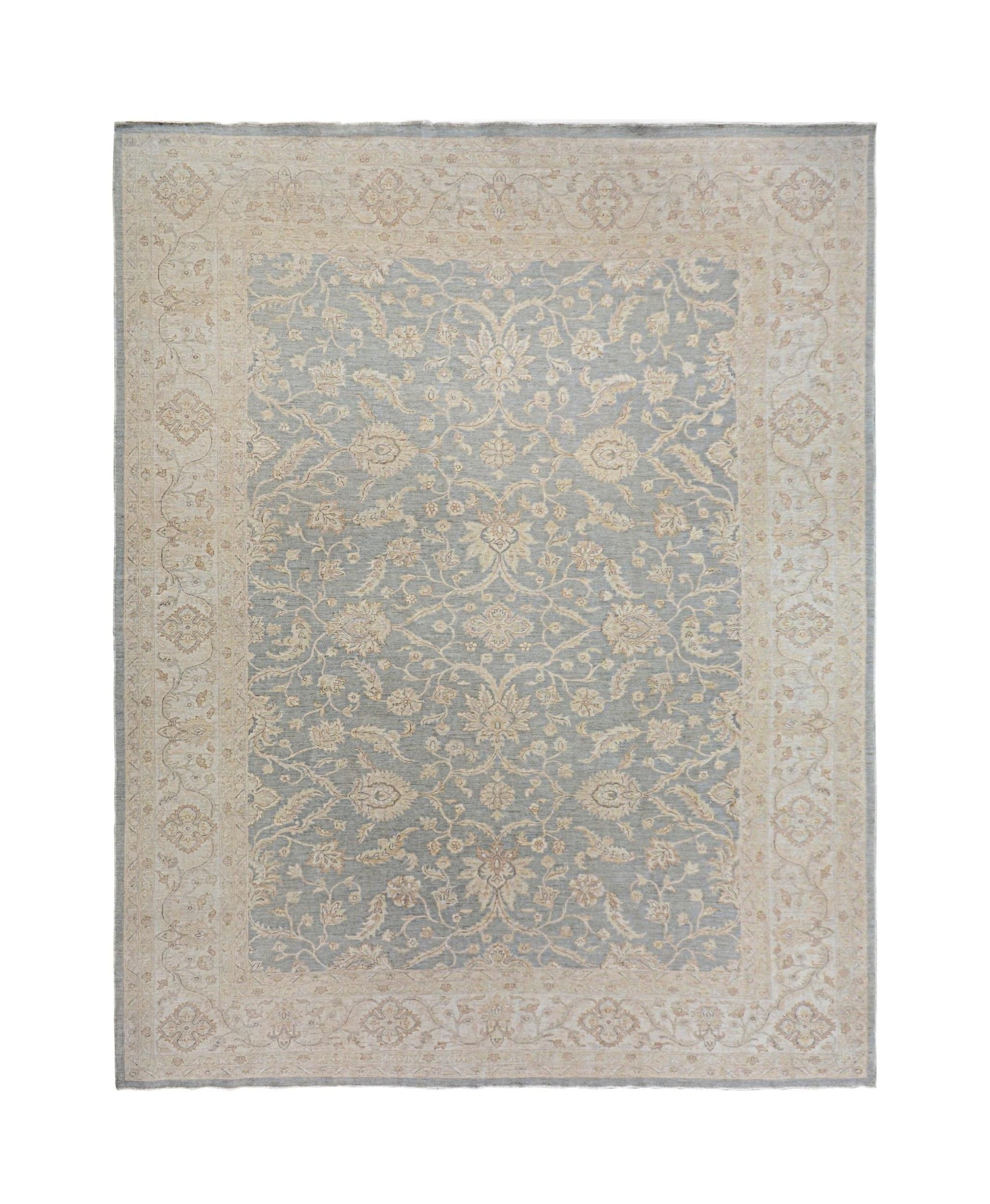 A handmade Afghan Chobi rug featuring a traditional floral pattern in soft blue and beige tones.