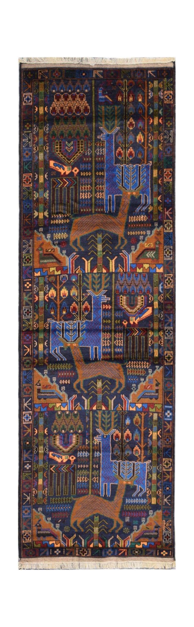 Handmade Afghan wool runner rug featuring a repeating hunting scene with deer on a blue background.