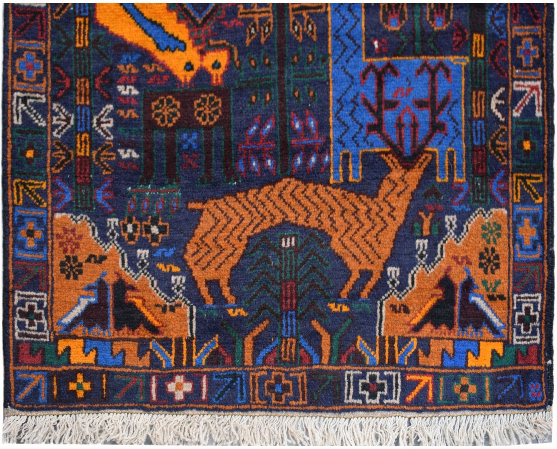 Handmade Afghan wool runner rug featuring a colorful hunting scene with animals and trees.