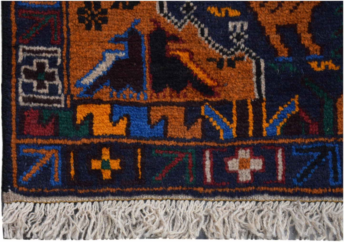 A handmade Afghan wool runner featuring a colorful hunting scene with geometric border patterns.