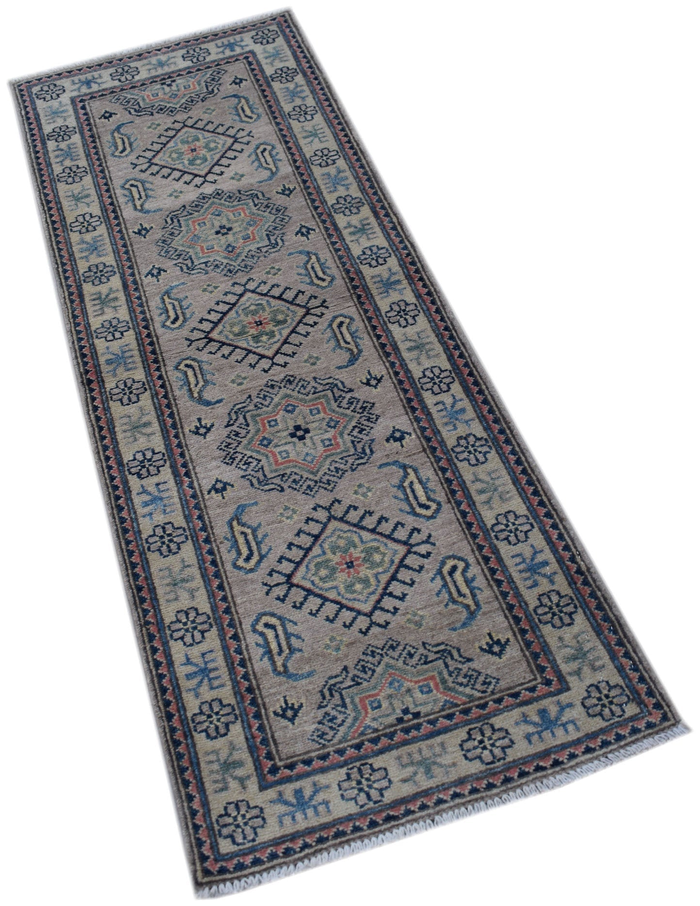 An Afghan Kazakh runner rug featuring traditional geometric motifs in blue, red, and beige tones.