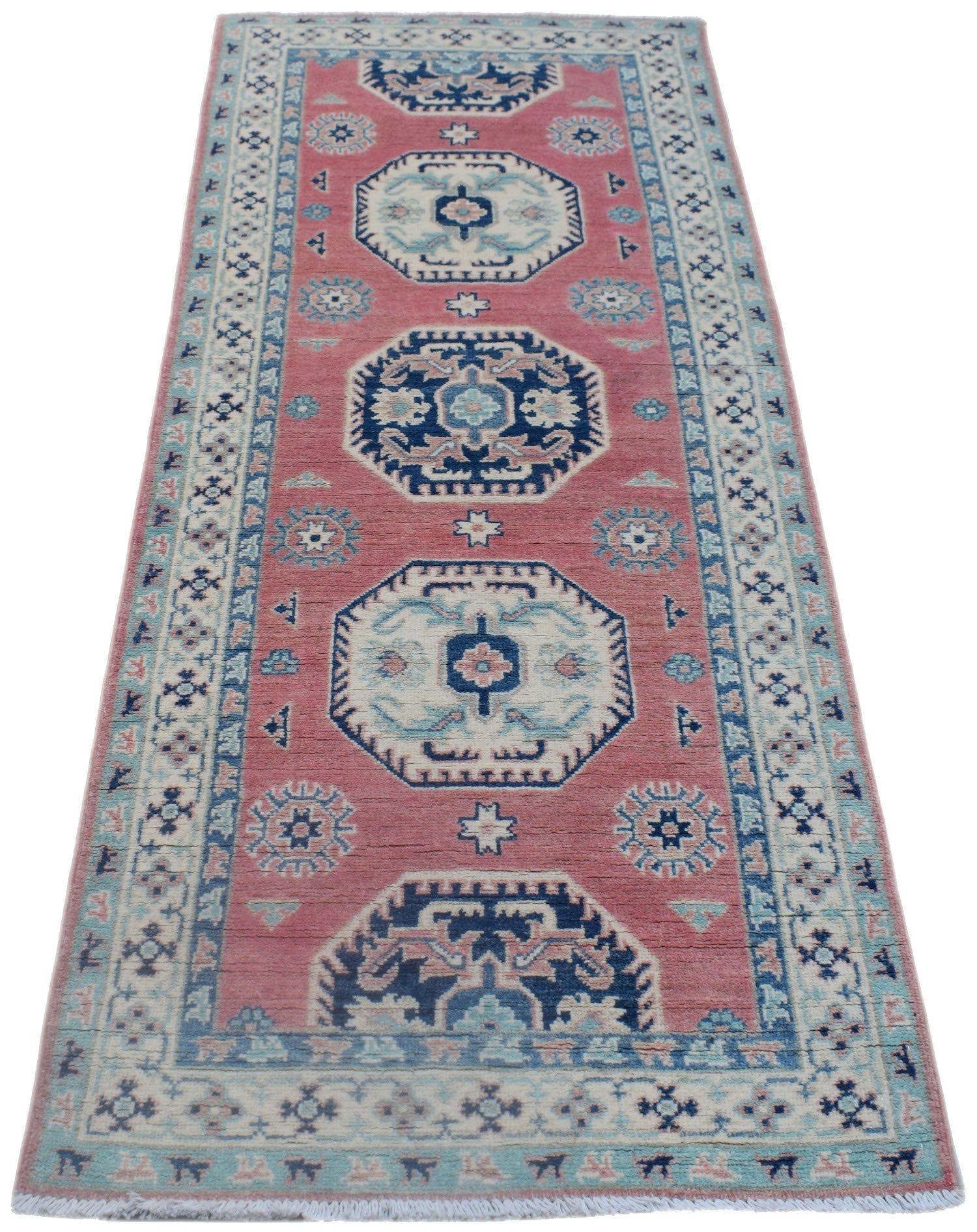 Handmade Afghan Kazakh runner rug featuring traditional geometric motifs in pink, blue, and cream.
