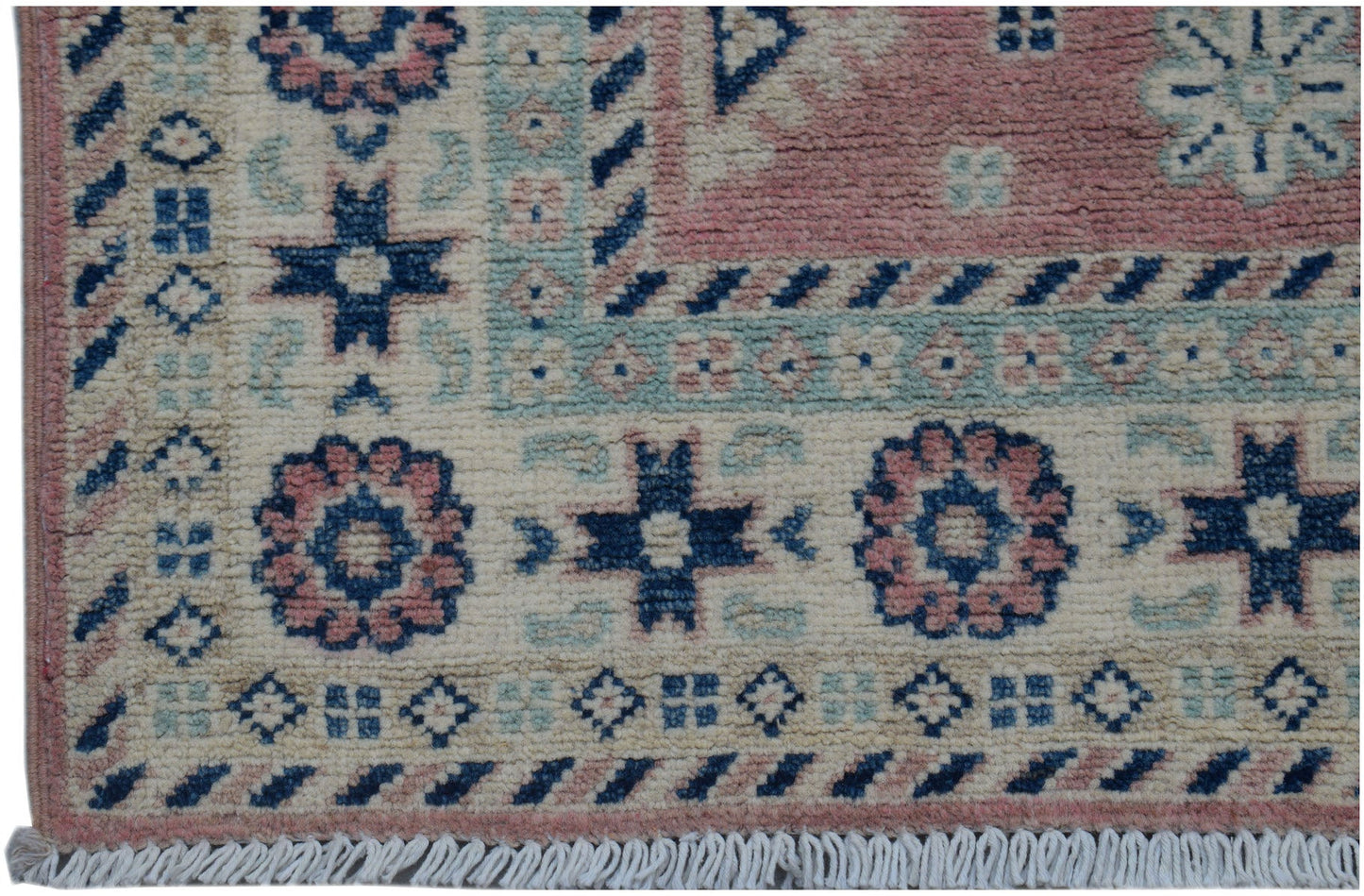 Handmade Afghan Kazakh runner featuring traditional geometric motifs in pink, blue, and cream.