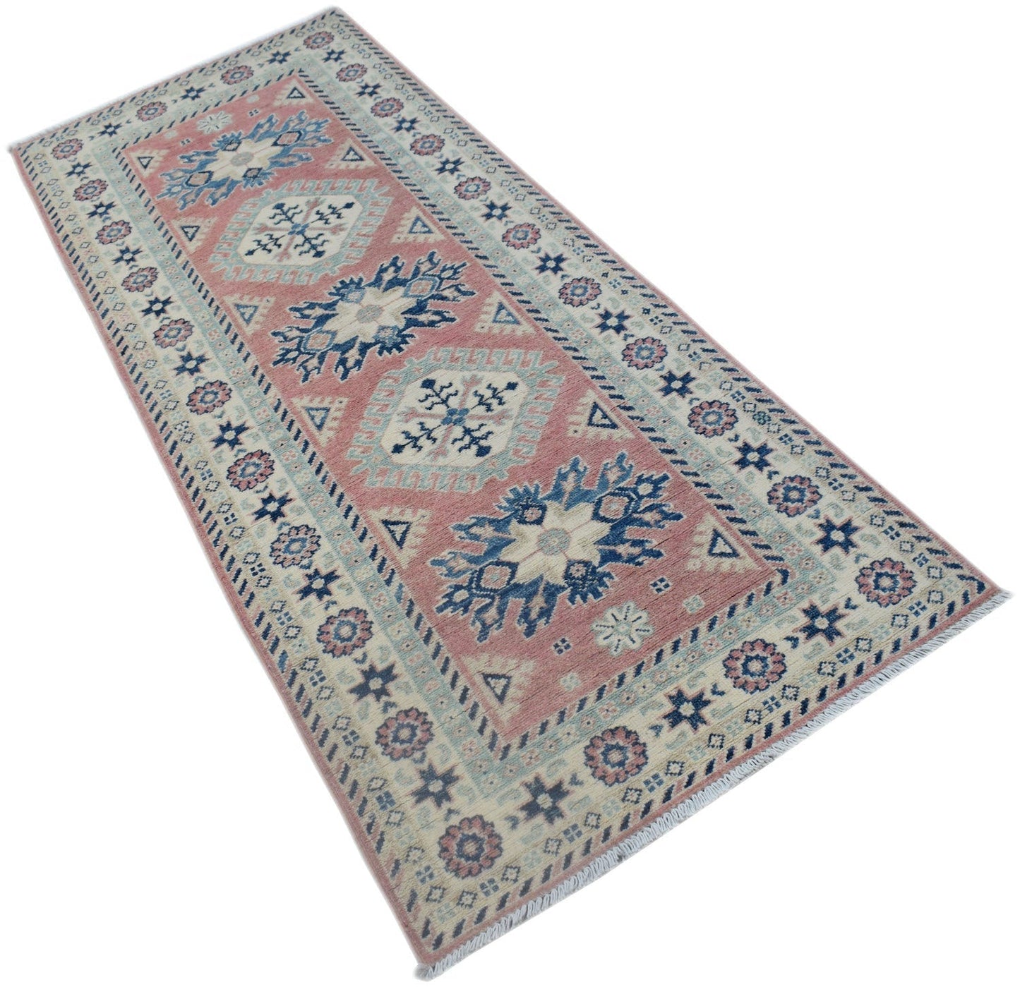 A handmade Afghan Kazakh runner rug featuring traditional geometric motifs in pink and blue tones.