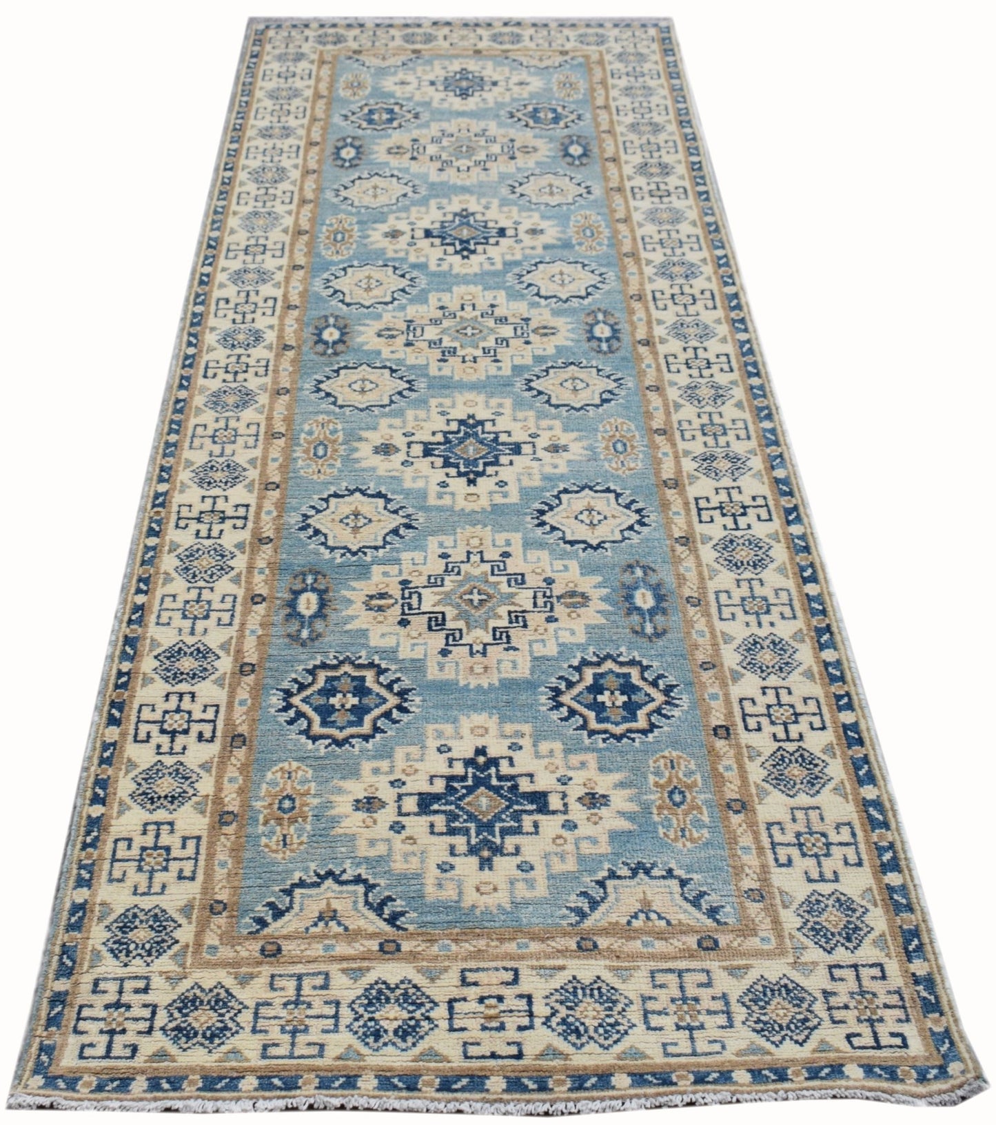 Handmade Afghan Kazakh runner rug featuring a geometric pattern in shades of blue and beige.