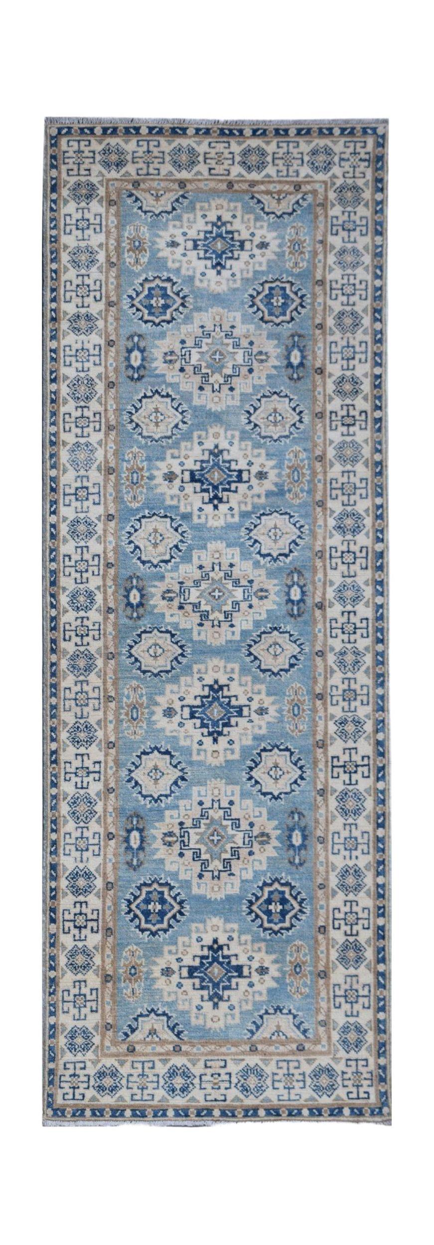 Handmade Afghan Kazakh runner rug featuring a geometric pattern in shades of blue and beige.