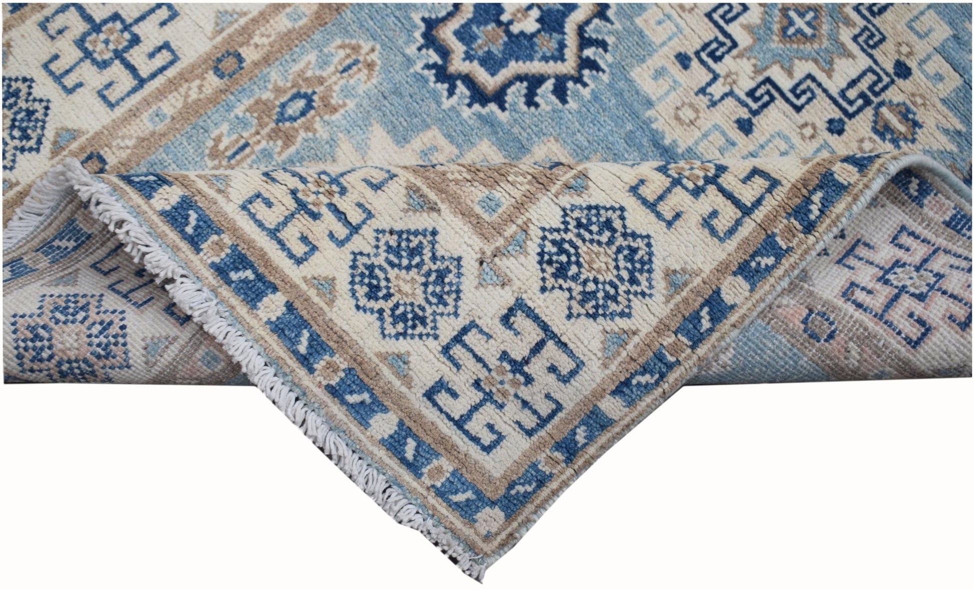 Handmade Afghan Kazakh runner rug featuring geometric patterns in shades of blue, beige, and grey.