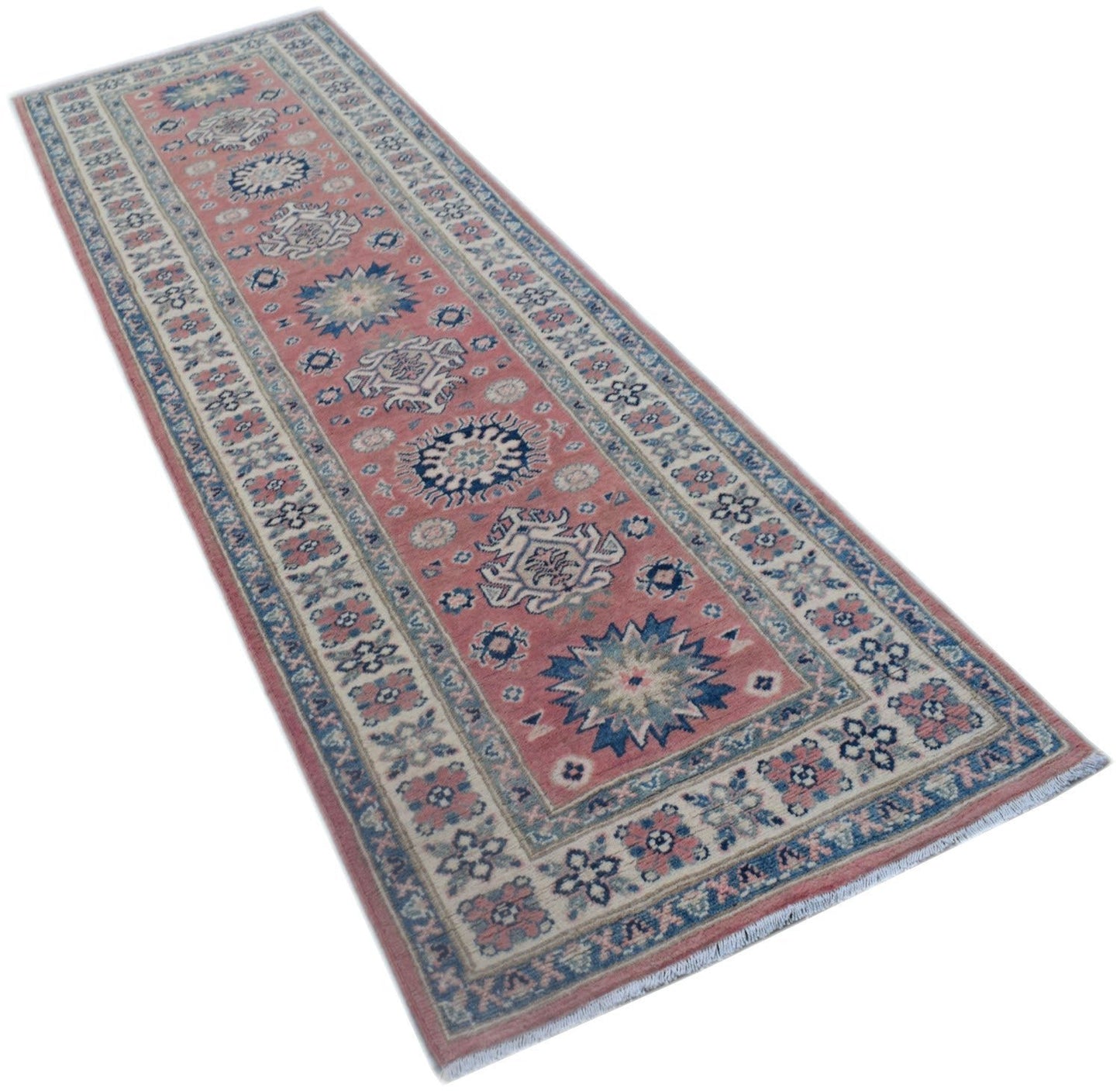 A handmade Afghan Kazakh runner rug featuring traditional geometric motifs in pink and blue tones.