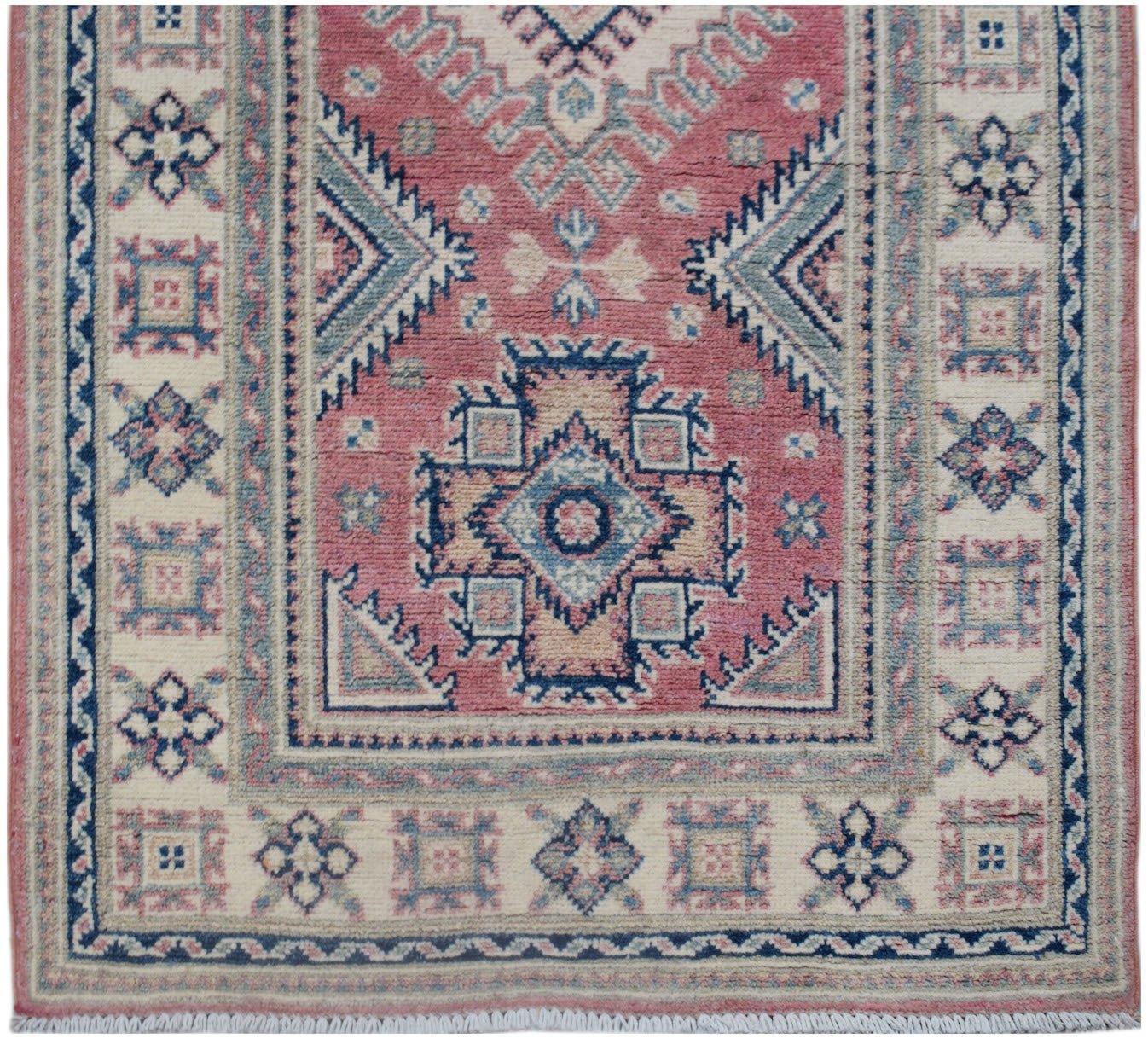 Handmade Afghan Kazakh runner rug featuring traditional geometric motifs in pink, blue, and cream.
