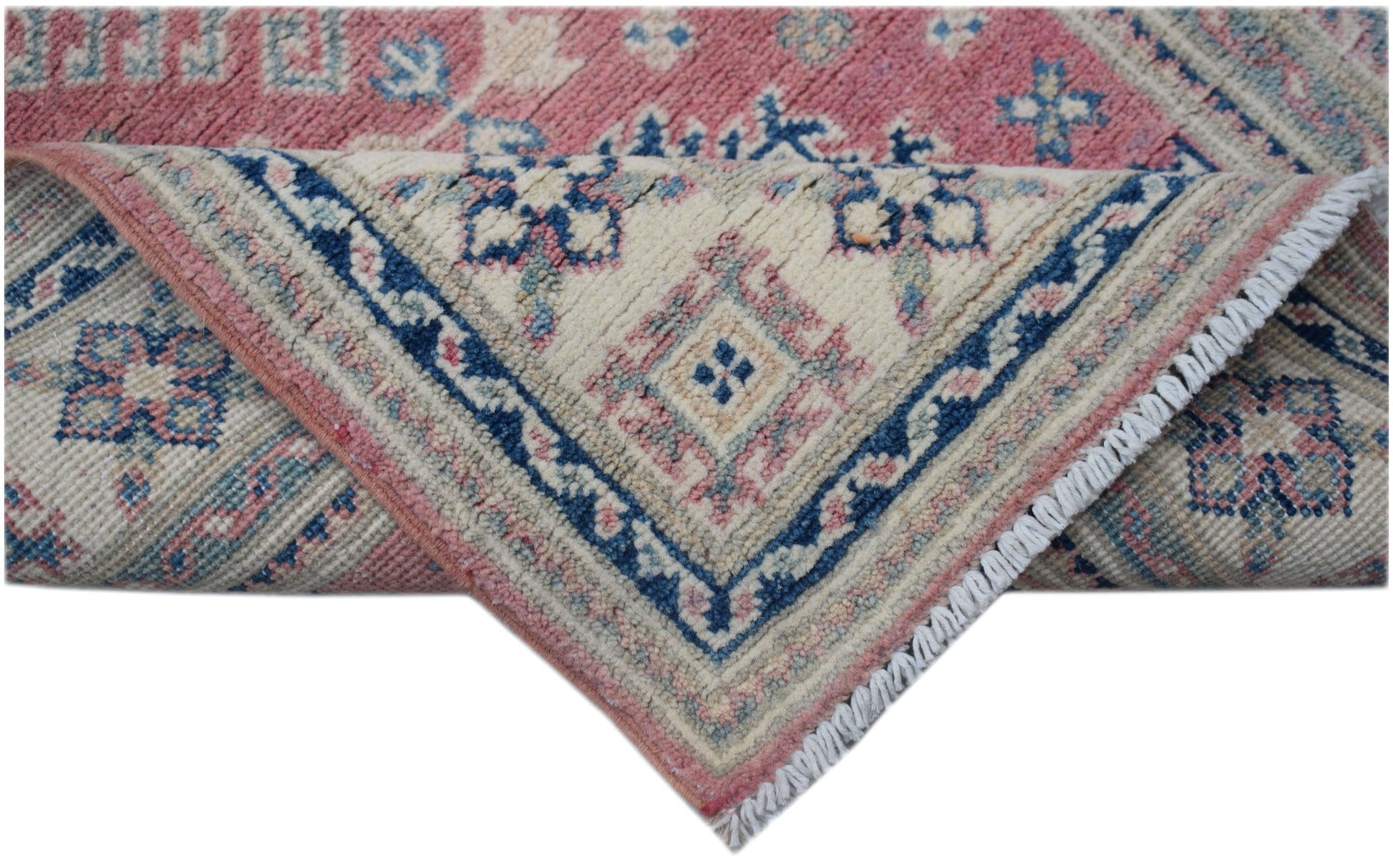 A handmade Afghan Kazakh runner featuring traditional geometric motifs in pink, blue, and cream.