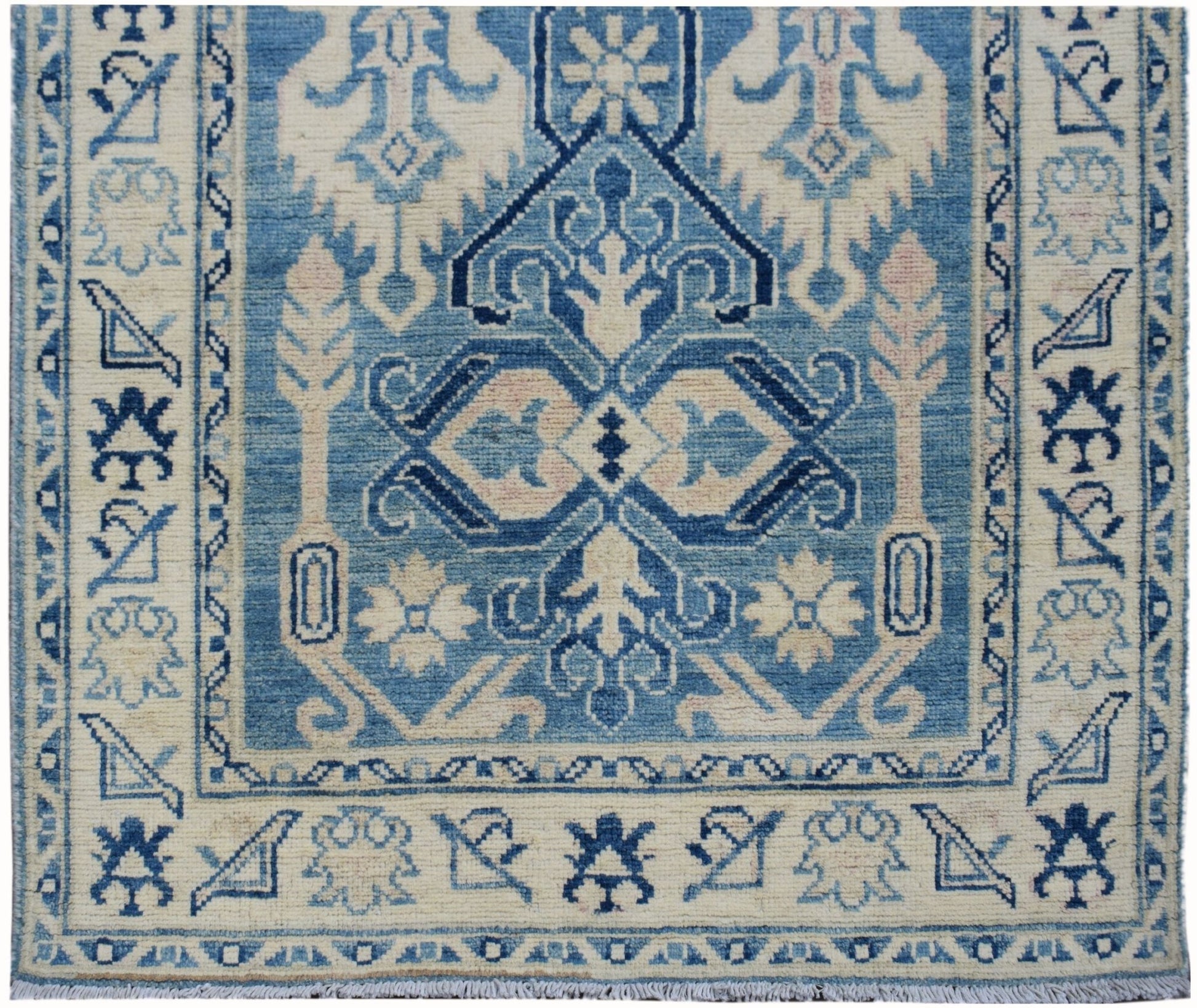 Handmade Afghan Kazakh runner rug featuring a geometric blue and beige pattern.