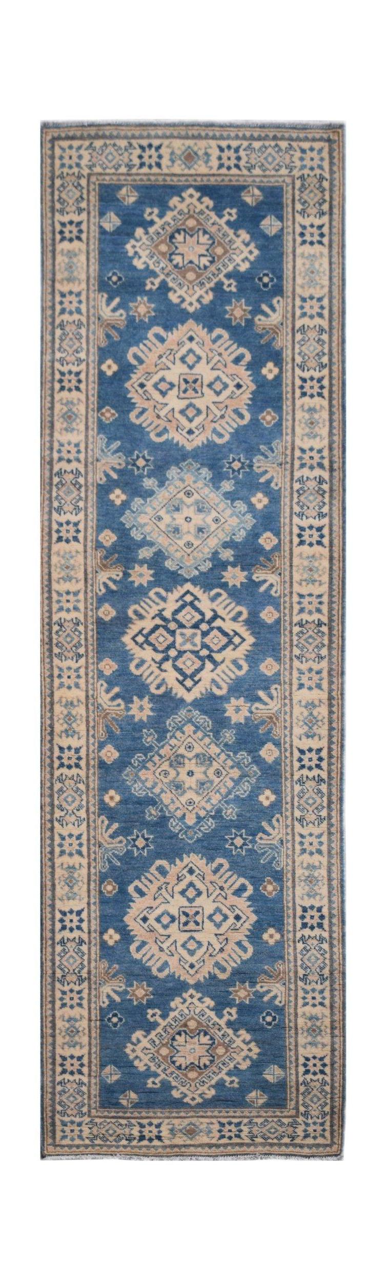 Handmade Afghan Kazakh runner rug featuring geometric medallions in blue and beige tones.