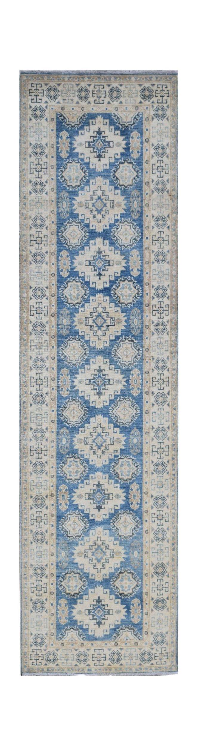 Handmade Afghan Kazakh runner rug featuring a geometric pattern in shades of blue and beige.