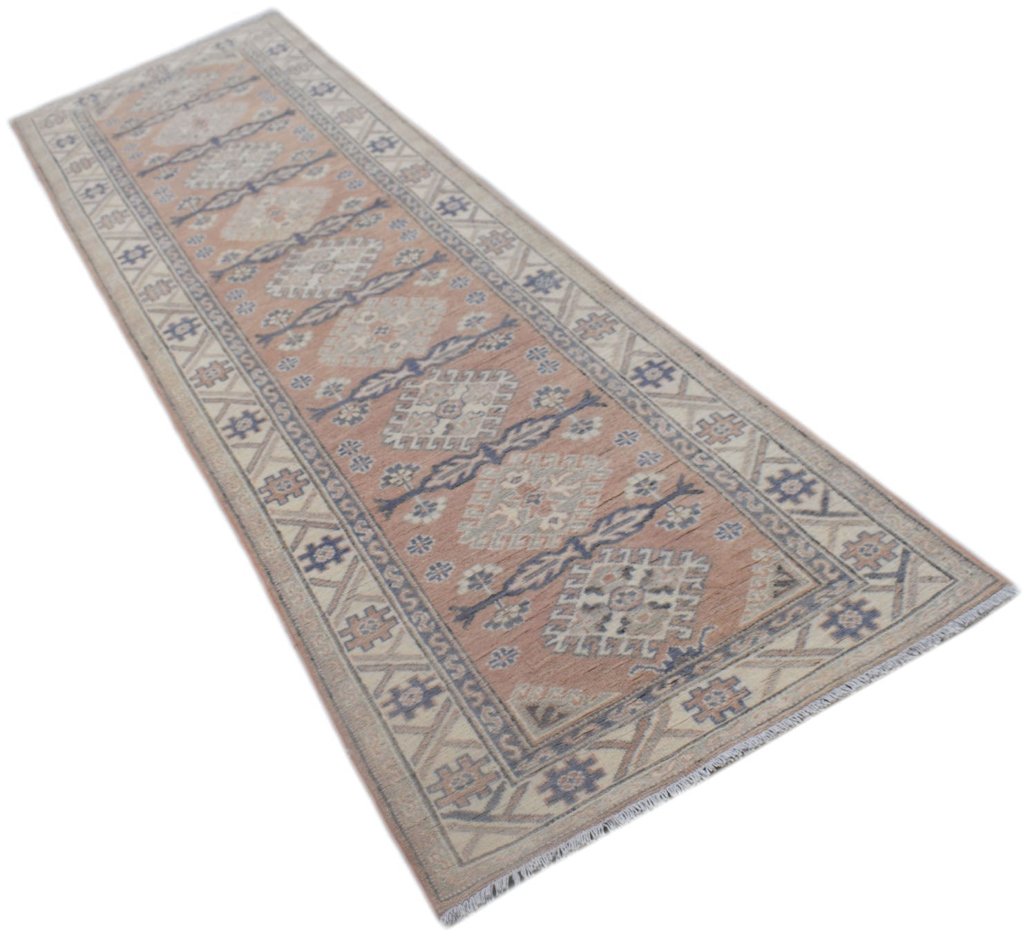 A handmade Afghan Kazakh runner rug featuring traditional geometric motifs in muted earth tones.