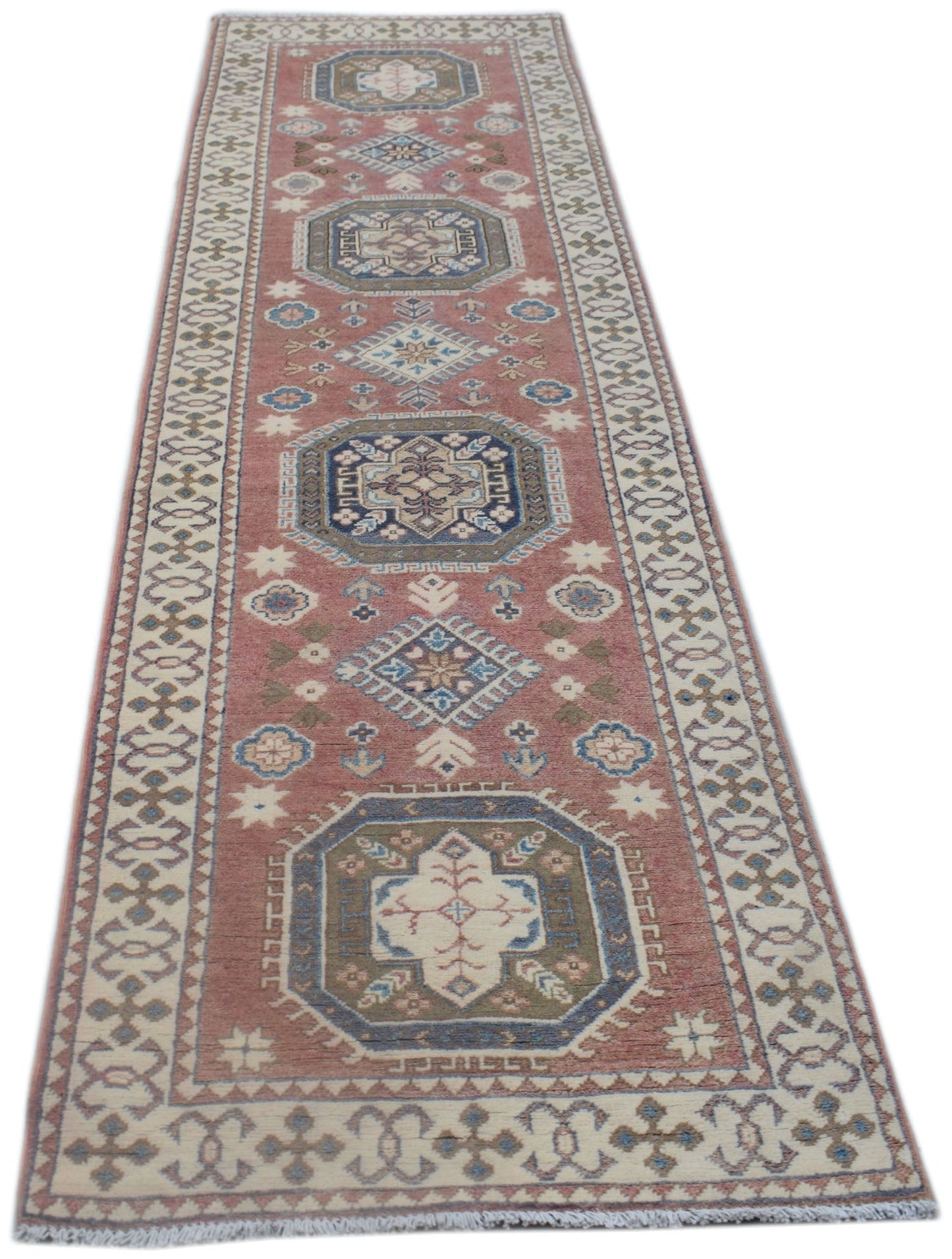 A handmade Afghan Kazakh runner rug featuring traditional geometric motifs in red and blue tones.