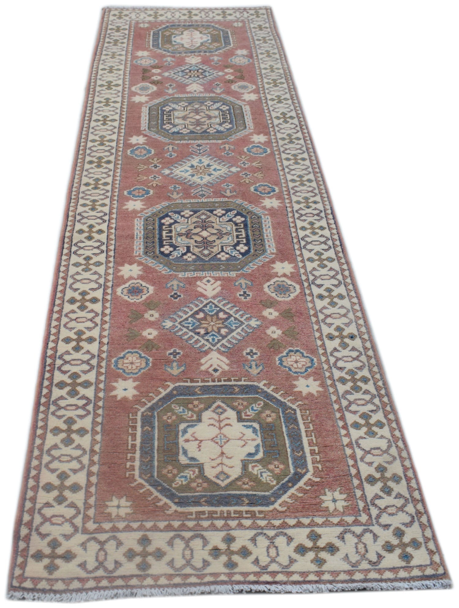A handmade Afghan Kazakh runner rug featuring traditional geometric motifs in red and blue tones.