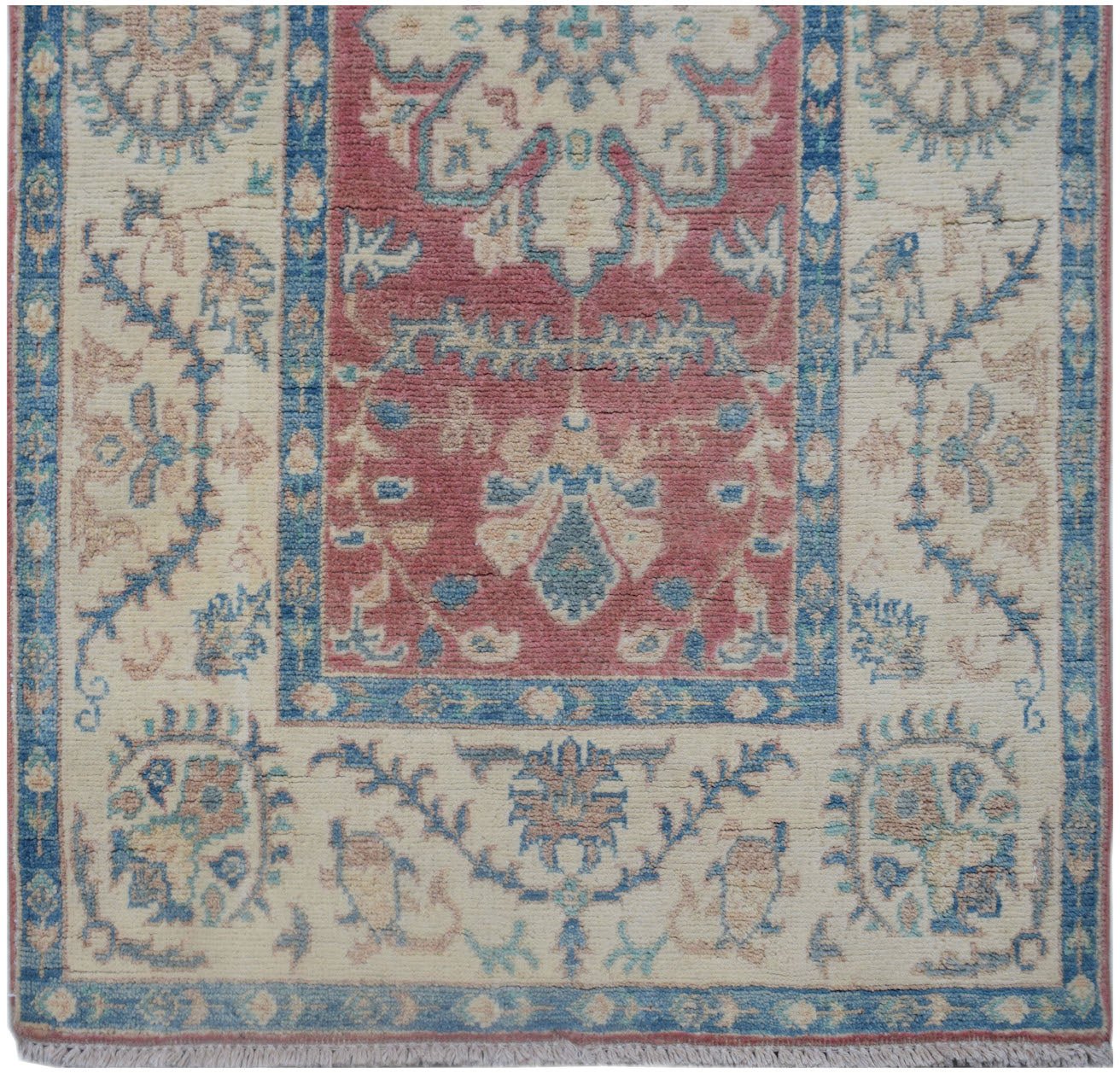 Handmade Afghan Kazakh runner rug featuring traditional geometric motifs in red, blue, and cream.
