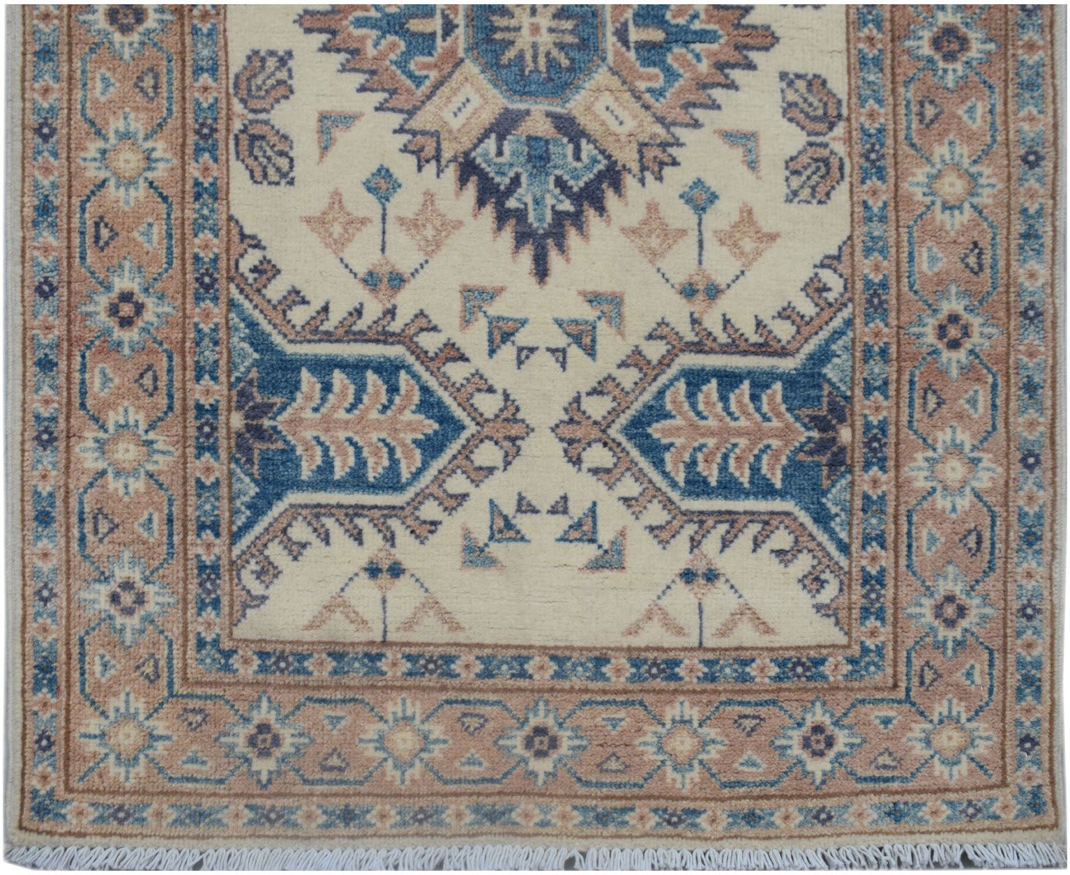 Handmade Afghan Kazakh runner featuring traditional geometric motifs in blue and tan on cream.