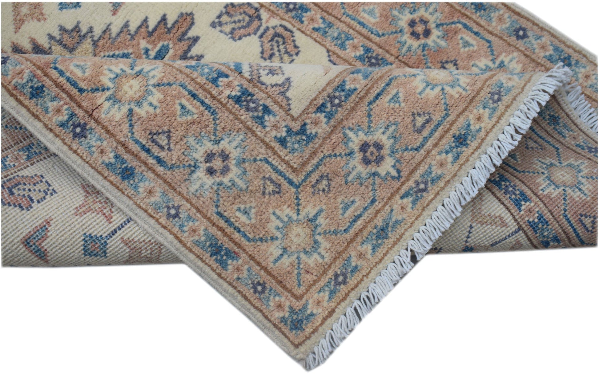 A handmade Afghan Kazakh runner featuring traditional blue and tan geometric motifs on wool.