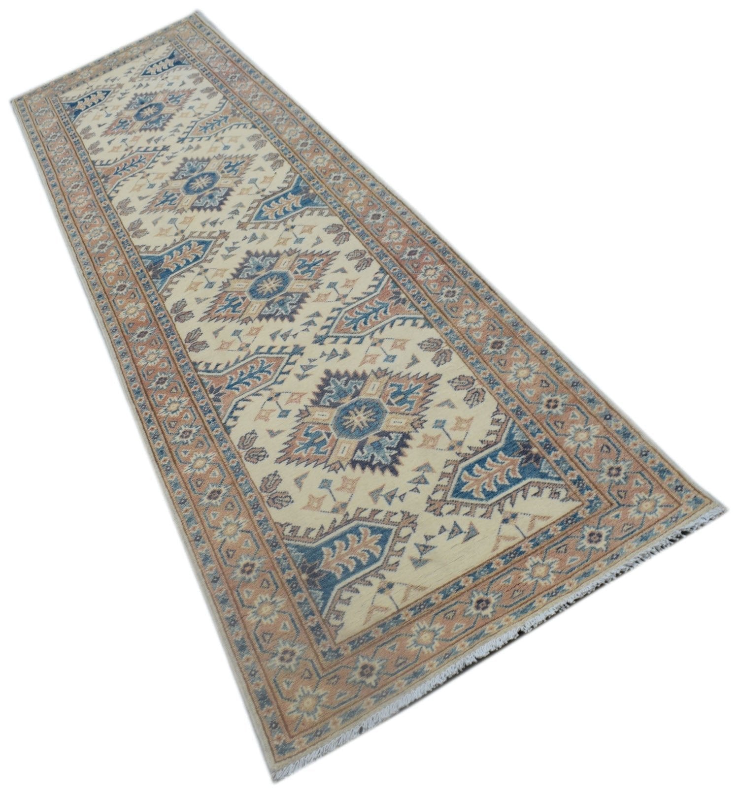 An Afghan Kazakh runner rug featuring traditional blue and tan geometric motifs on a cream field.
