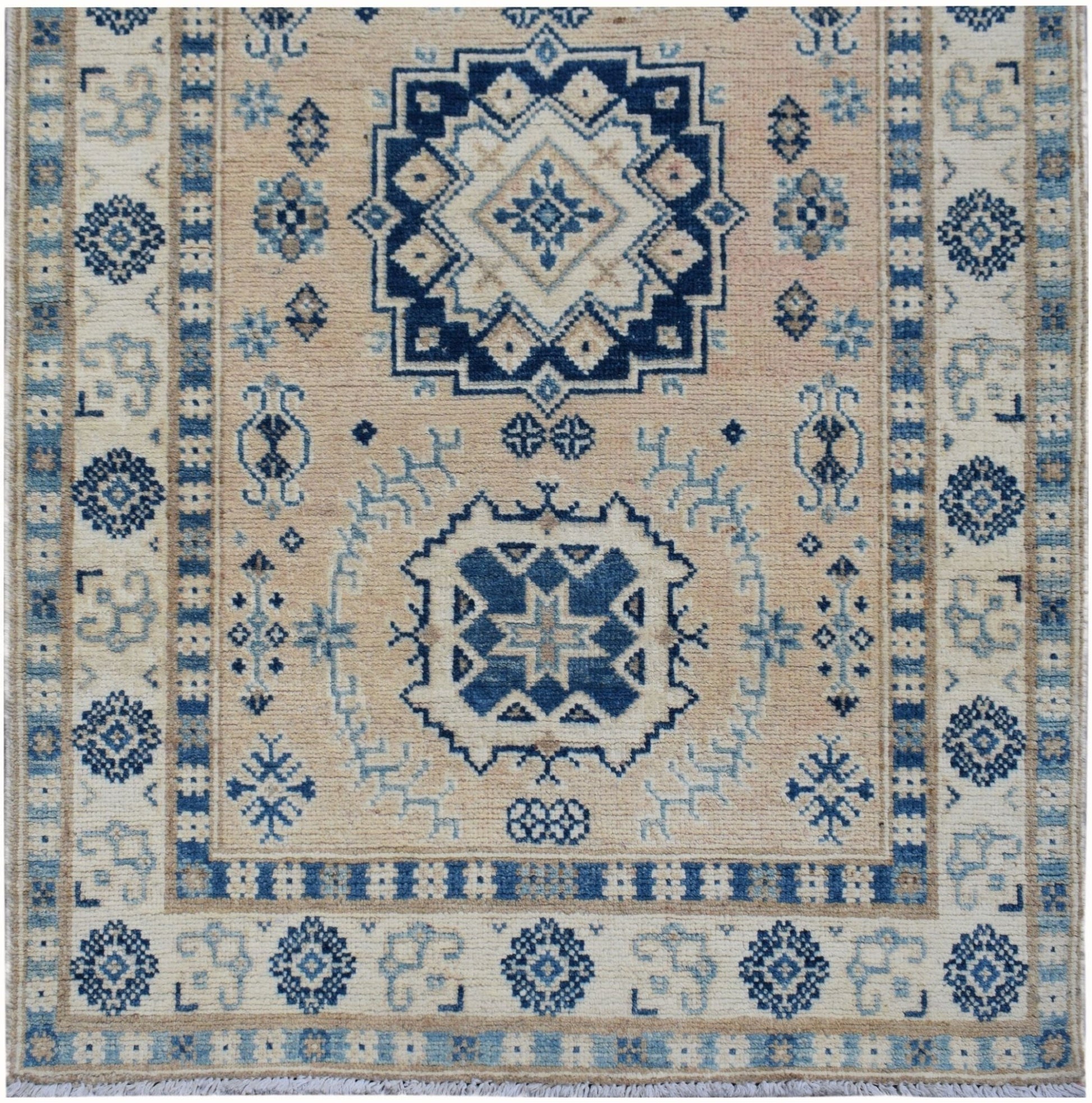 Handmade Afghan Kazakh runner featuring traditional geometric patterns in blue and beige wool.