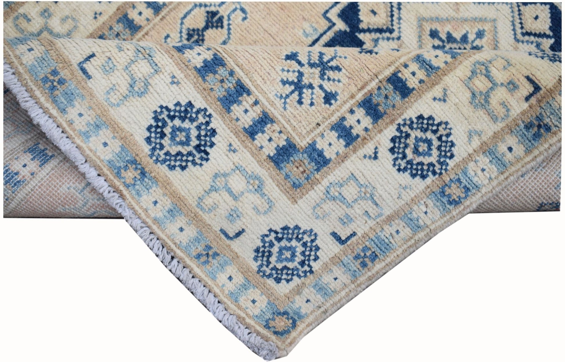 A handmade Afghan Kazakh runner featuring traditional blue and beige geometric patterns.