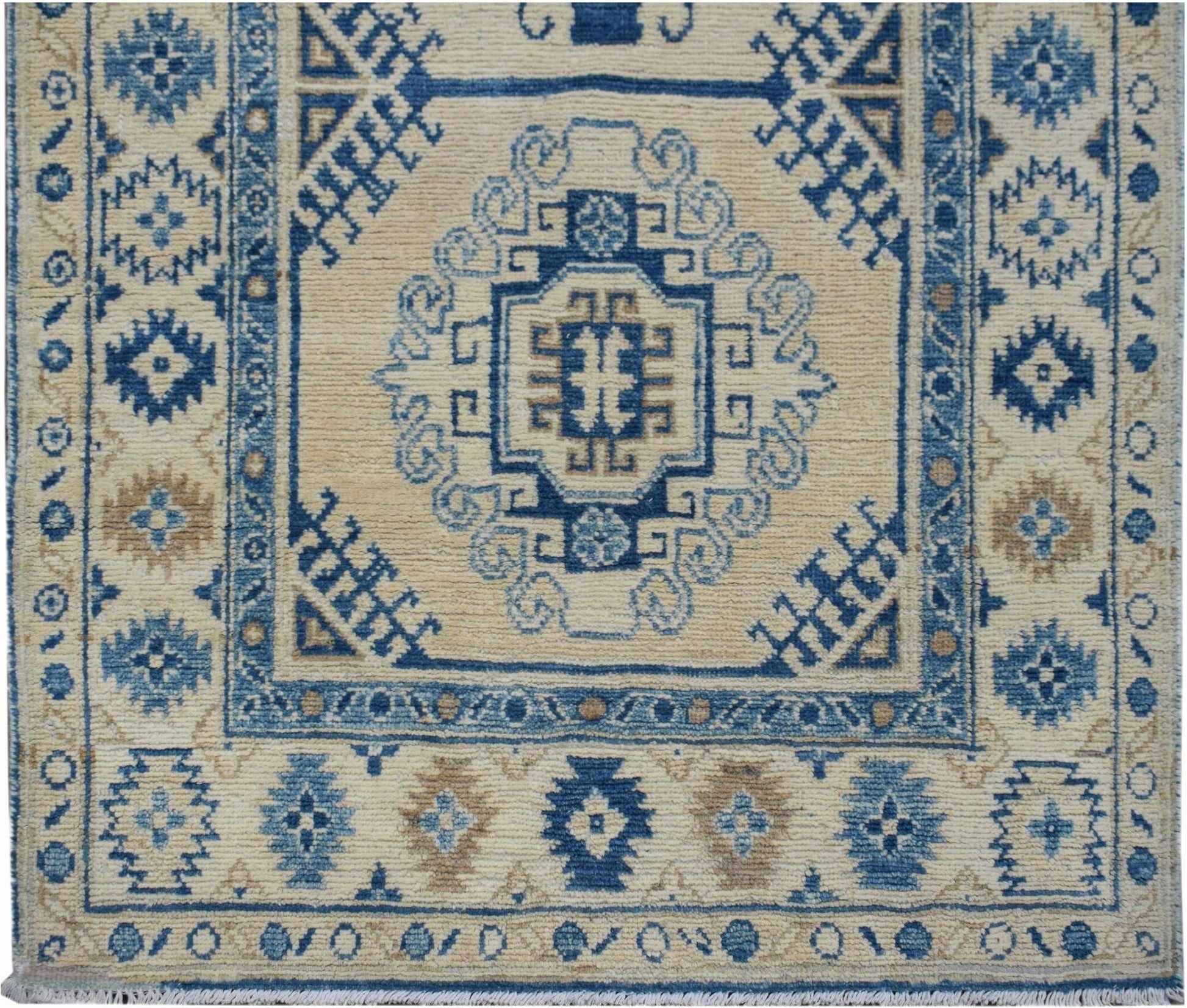 Handmade Afghan Kazakh runner rug featuring traditional blue and beige geometric patterns.