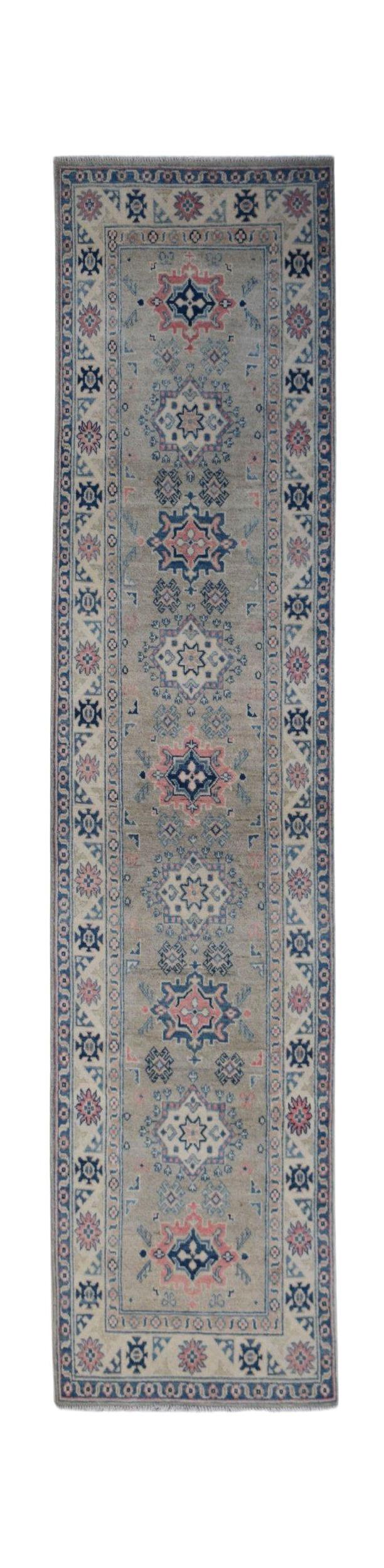 Handmade Afghan Kazakh runner rug featuring traditional geometric motifs in blue, pink, and grey.