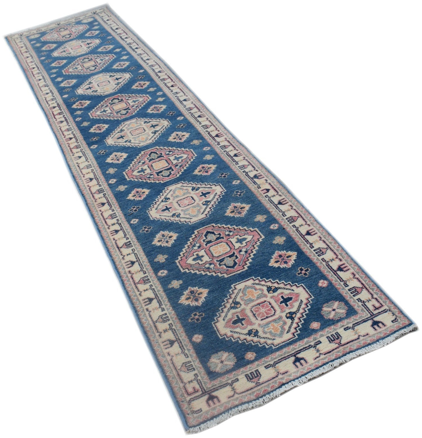A handmade Afghan Kazakh runner rug featuring traditional geometric motifs in blue and cream tones.