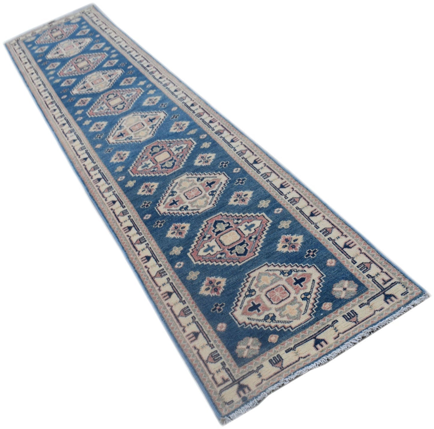 A handmade Afghan Kazakh runner rug featuring traditional geometric motifs in blue and cream.