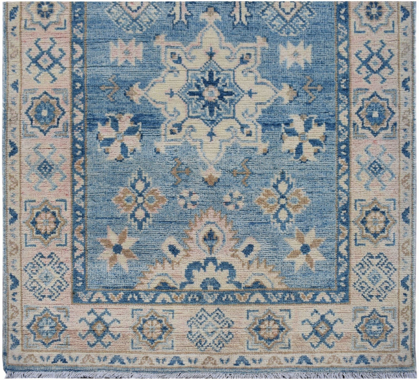 Handmade Afghan Kazakh runner featuring a traditional geometric pattern in blue and beige tones.