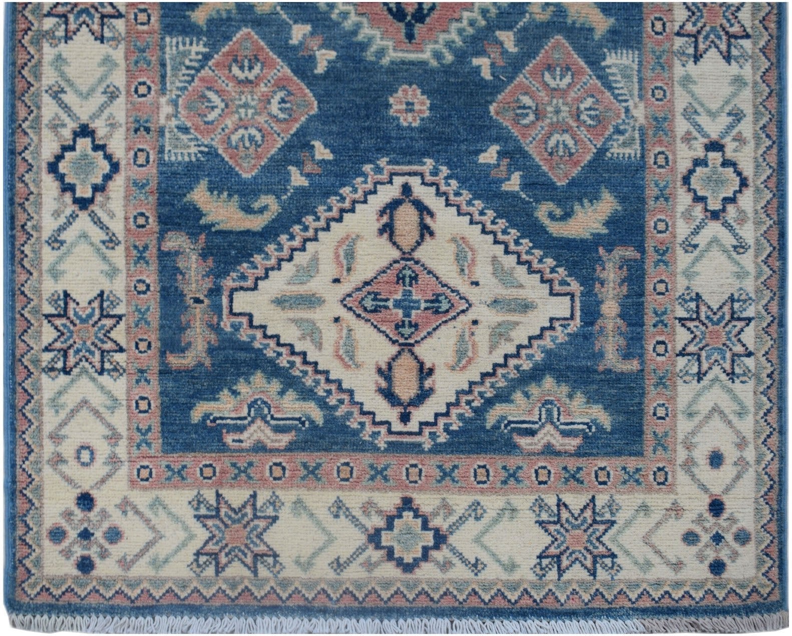 Handmade Afghan Kazakh runner rug featuring a blue field with geometric diamond motifs.