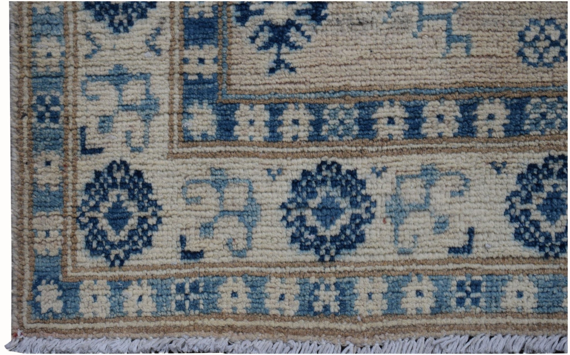 Handmade Afghan Kazakh runner rug featuring a geometric blue and beige pattern with fringe ends.