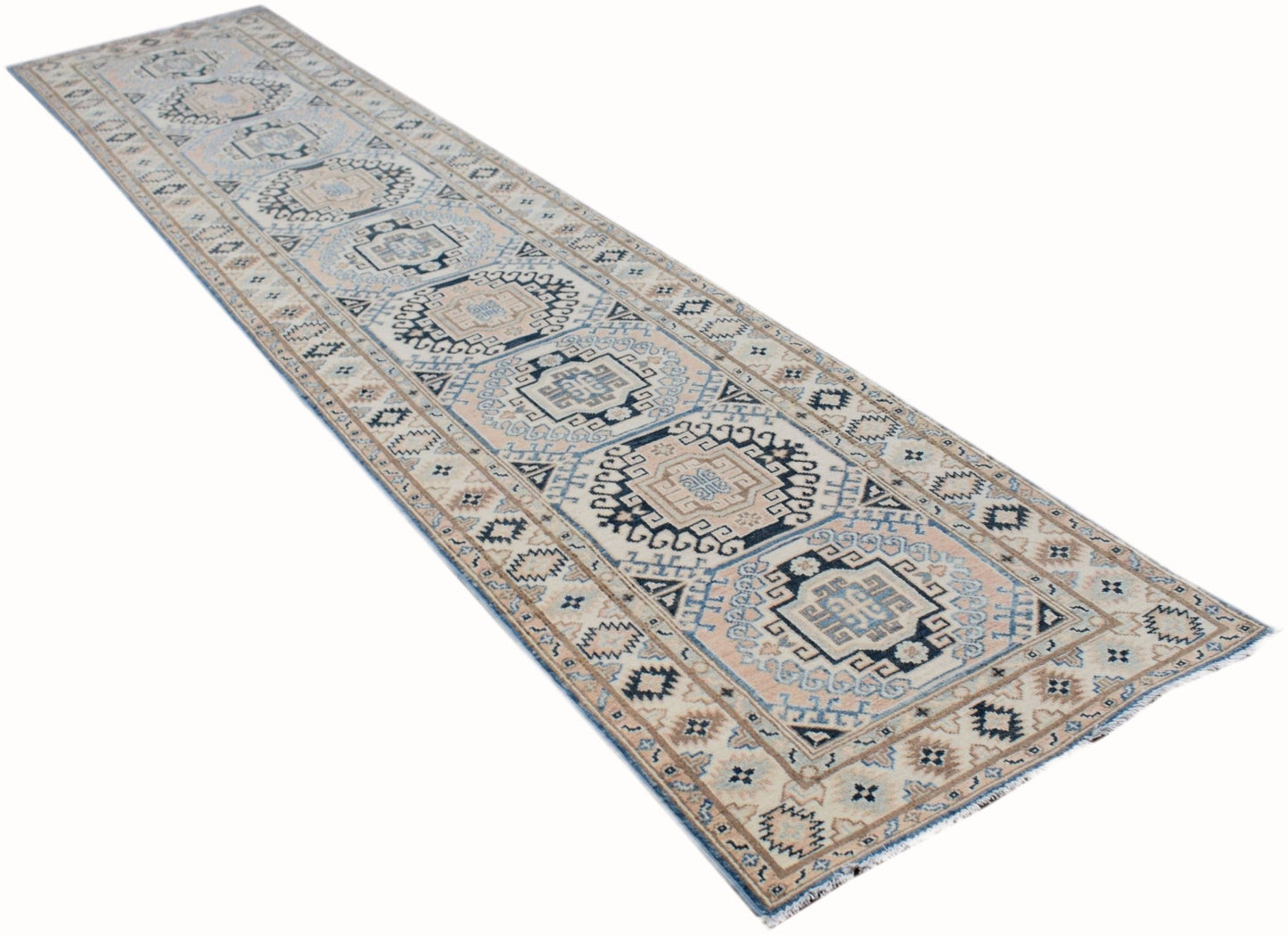 A handmade Afghan Kazakh runner rug featuring a geometric pattern in shades of beige and blue.