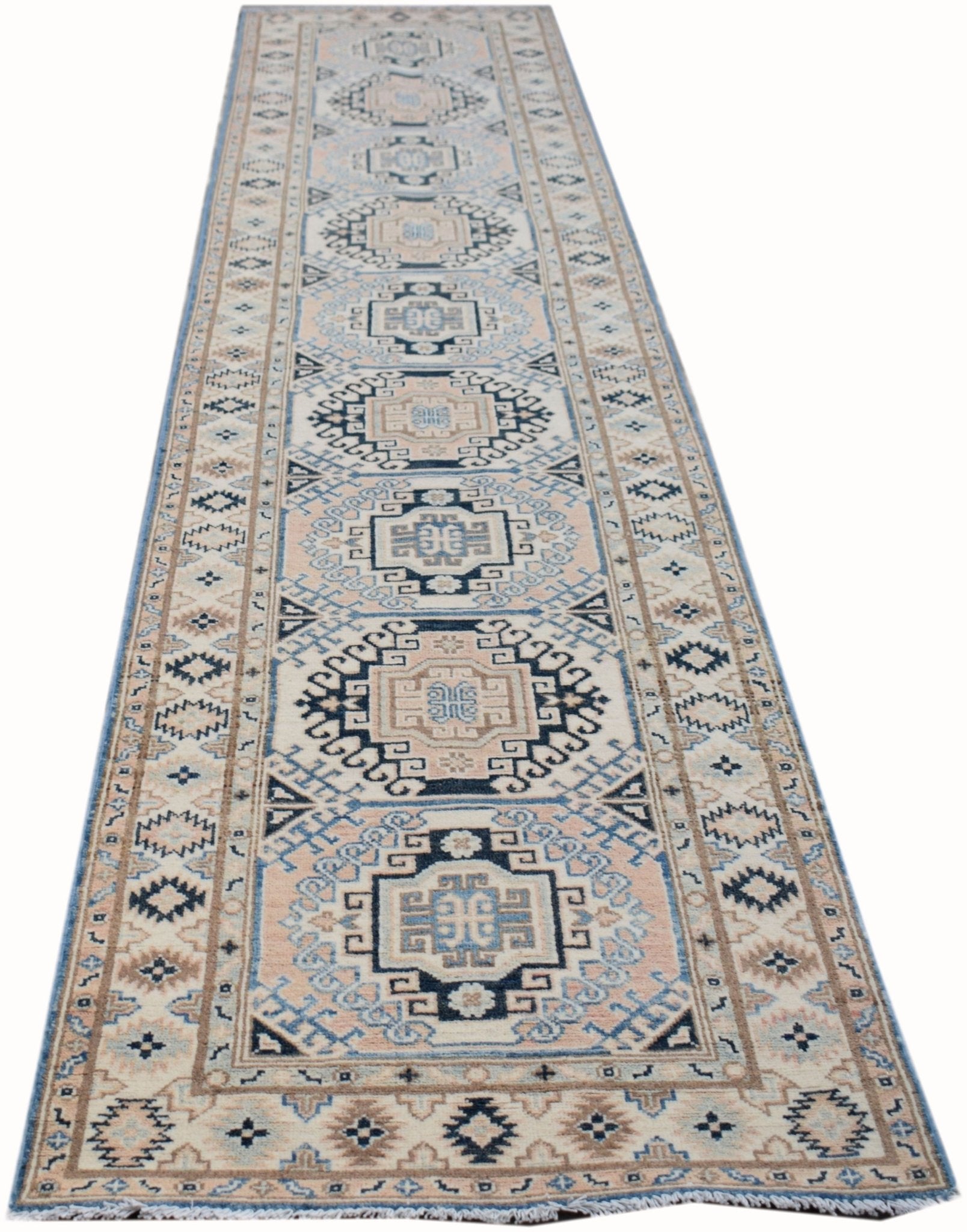 A handmade Afghan Kazakh runner rug featuring a geometric pattern in shades of beige and blue.