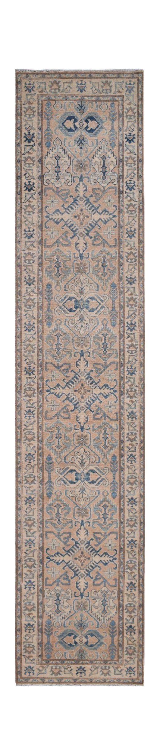 Handmade Afghan Kazakh runner rug featuring a beige field with blue and grey geometric patterns.