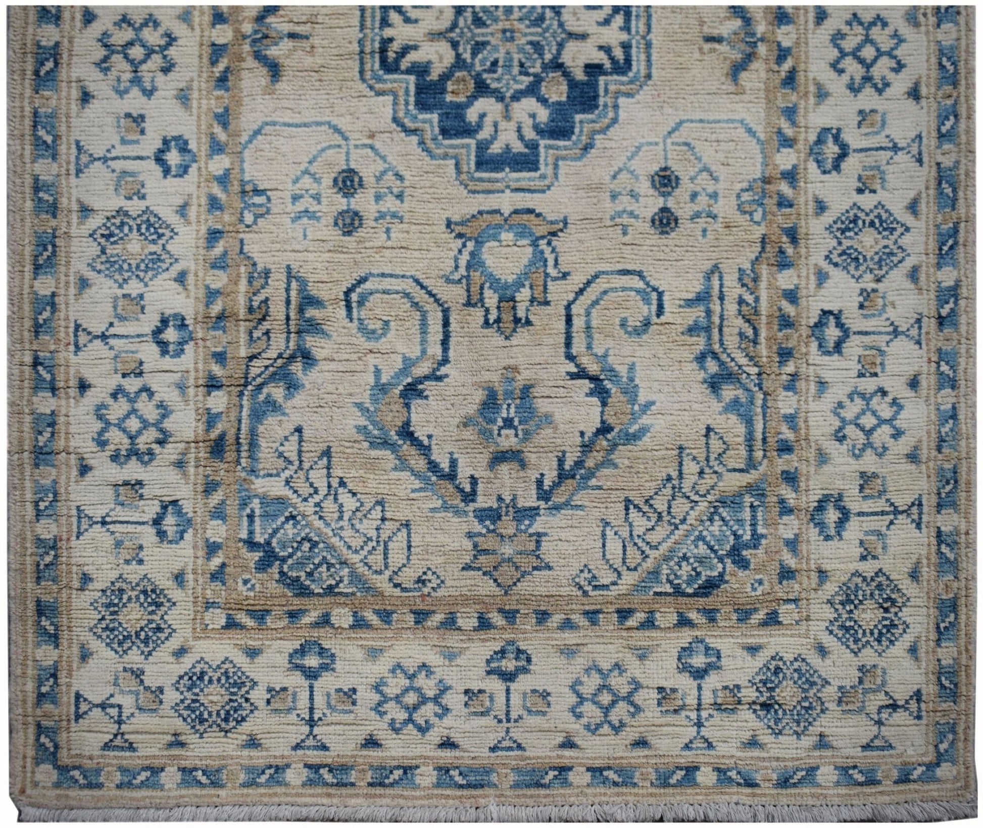 Handmade Afghan Kazakh runner rug featuring a traditional blue and beige geometric pattern.