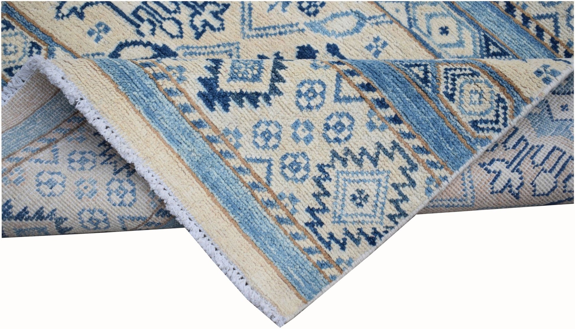 An Afghan Kazakh runner rug featuring a geometric pattern in shades of blue and beige.