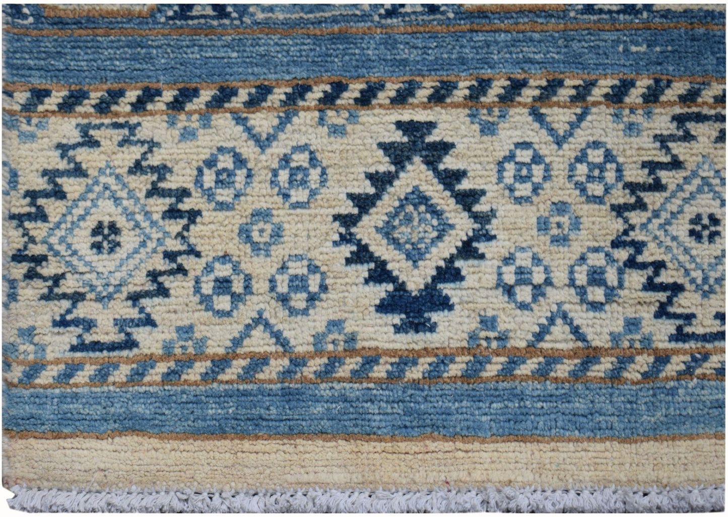 Handmade Afghan Kazakh runner rug featuring geometric blue and beige tribal patterns.