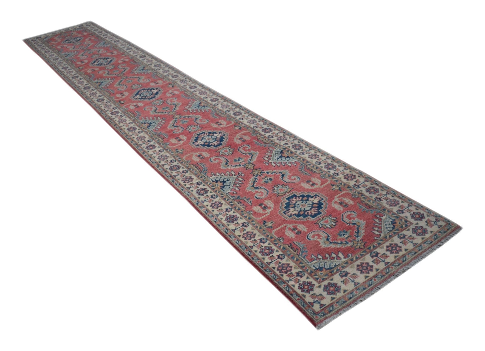 A handmade Afghan Kazakh runner rug featuring traditional geometric motifs in red and blue tones.