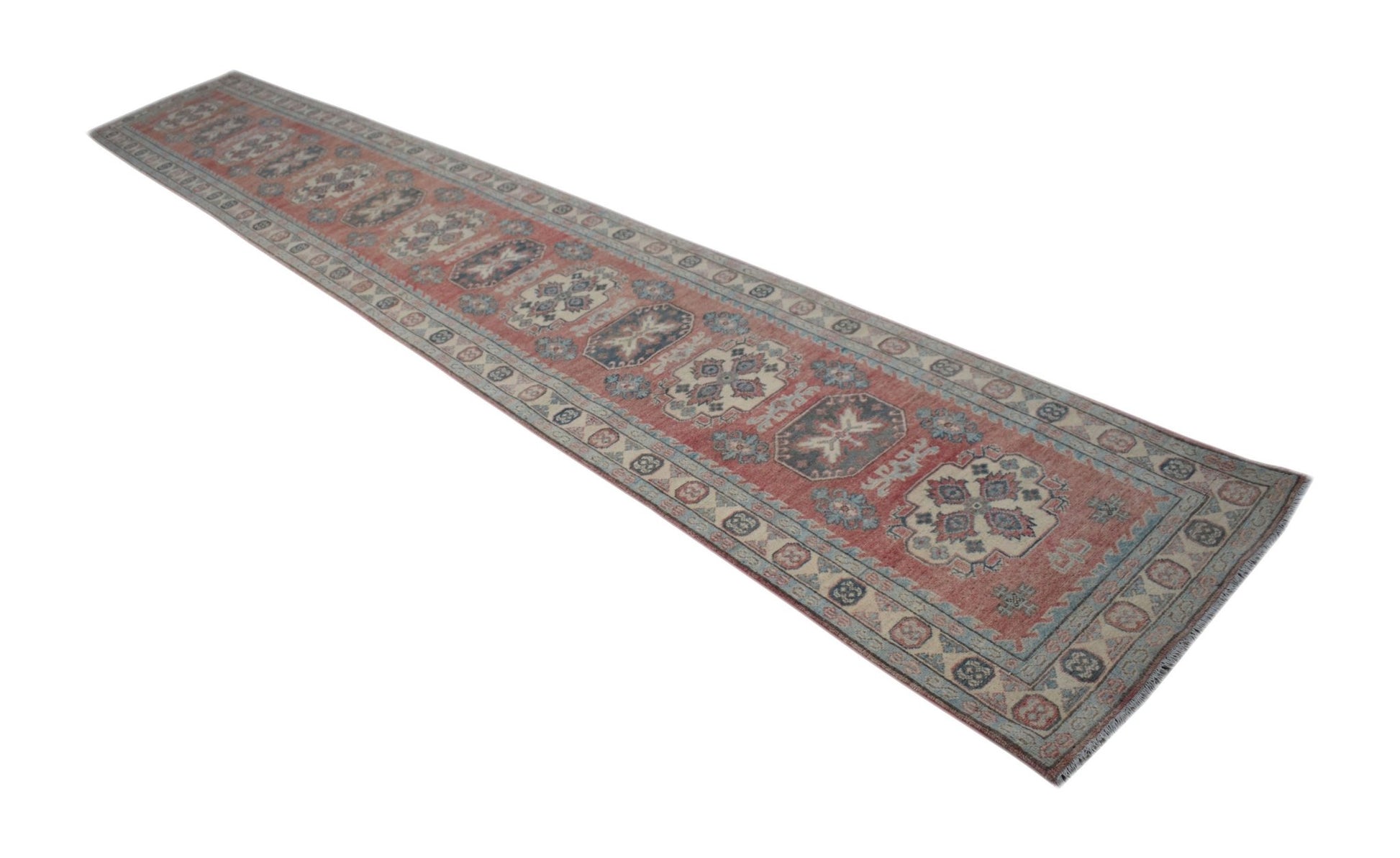 A handmade Afghan Kazakh runner rug featuring traditional geometric motifs in red, blue, and cream.