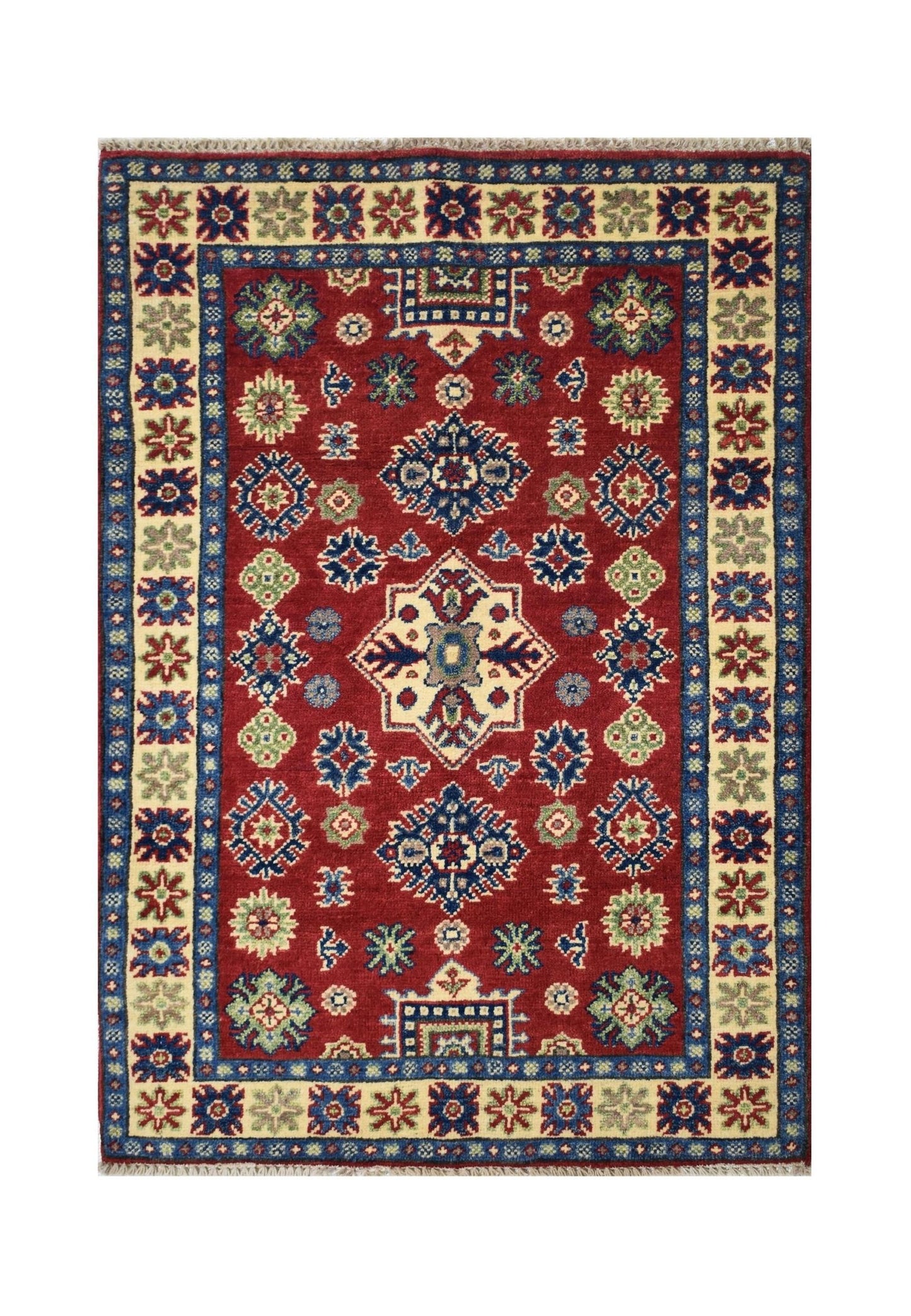 Handmade Afghan Kazakh rug featuring a traditional geometric pattern in red, blue, and cream.